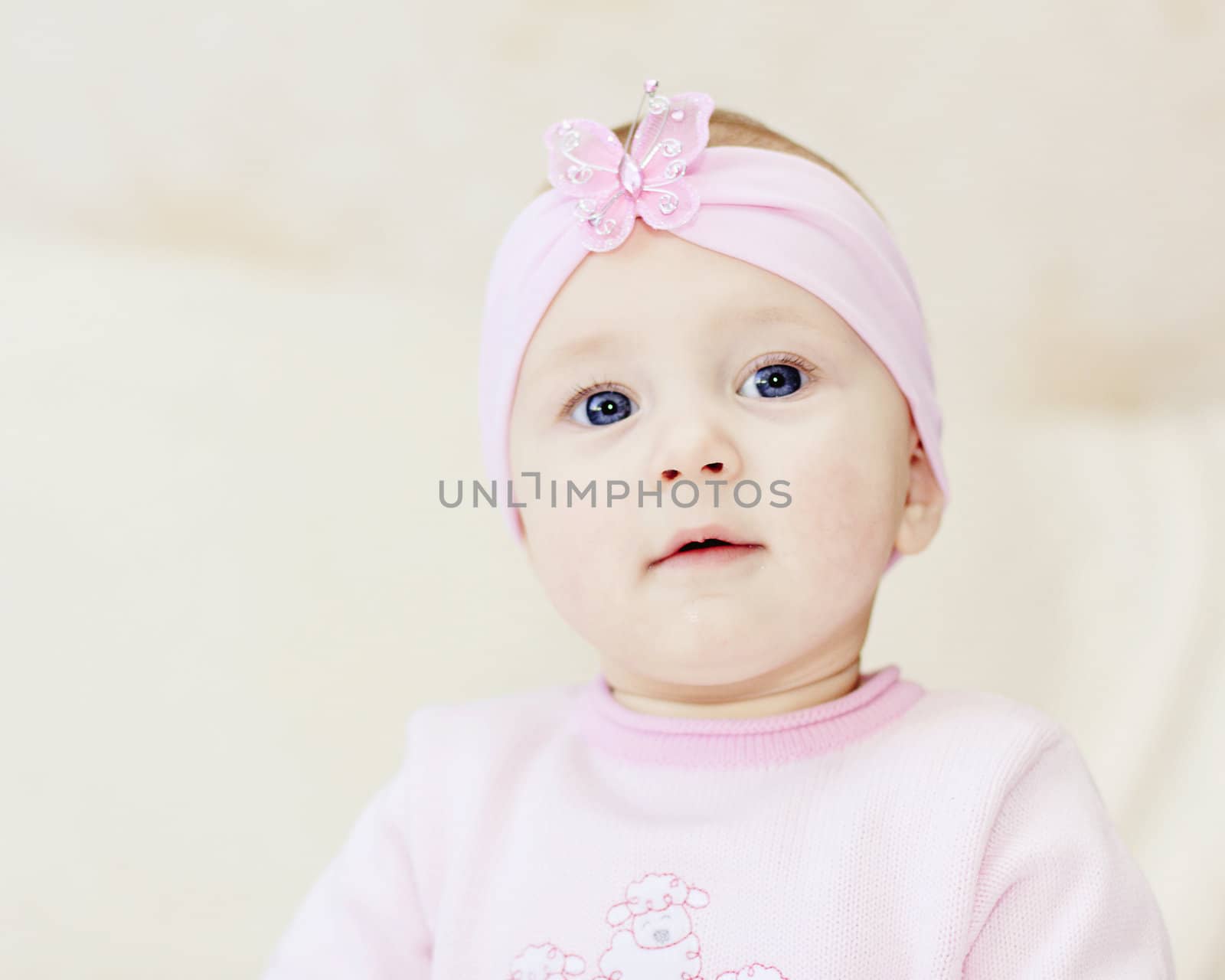 bright closeup portrait of adorable baby girl