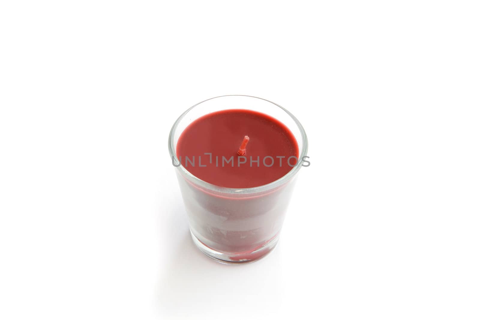 Red candle in a glass by phovoir