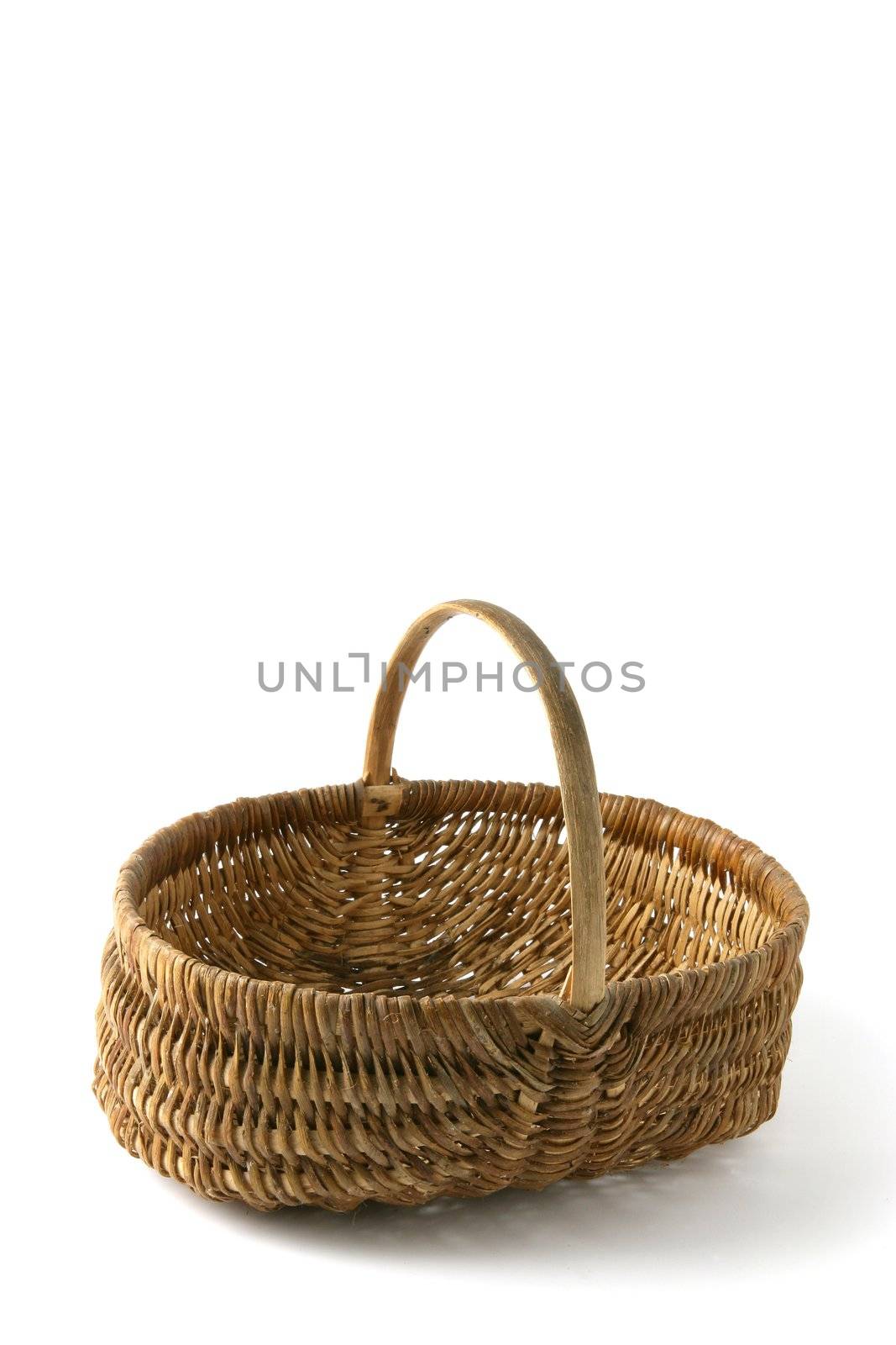 Empty wicker basket by phovoir