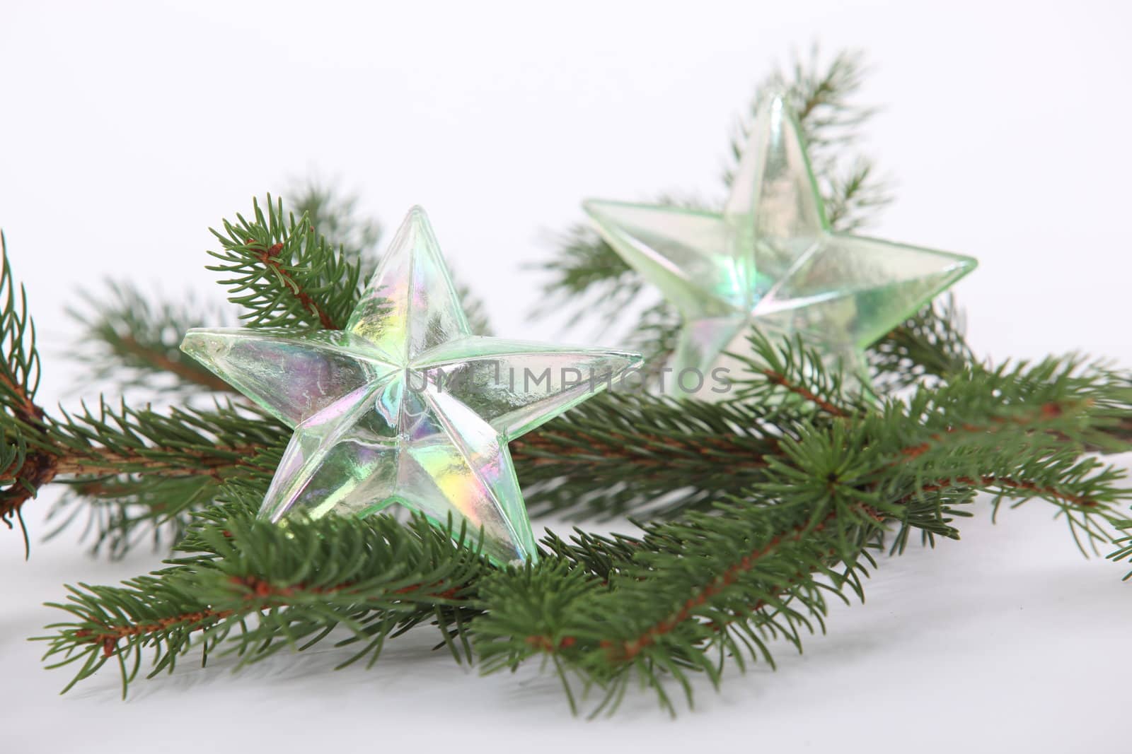 Christmas tree decorations on branch by phovoir