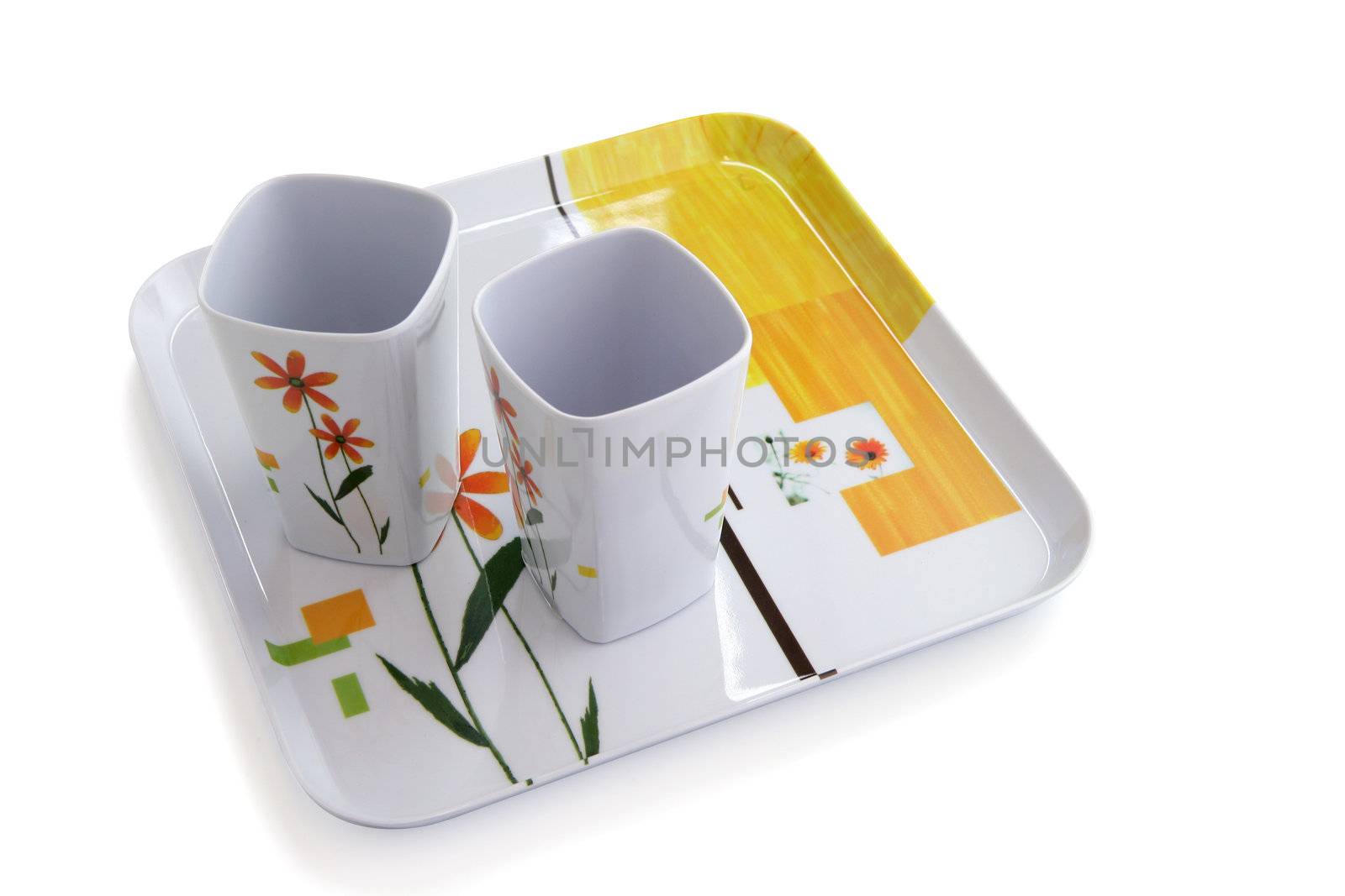 Empty mugs on serving tray by phovoir