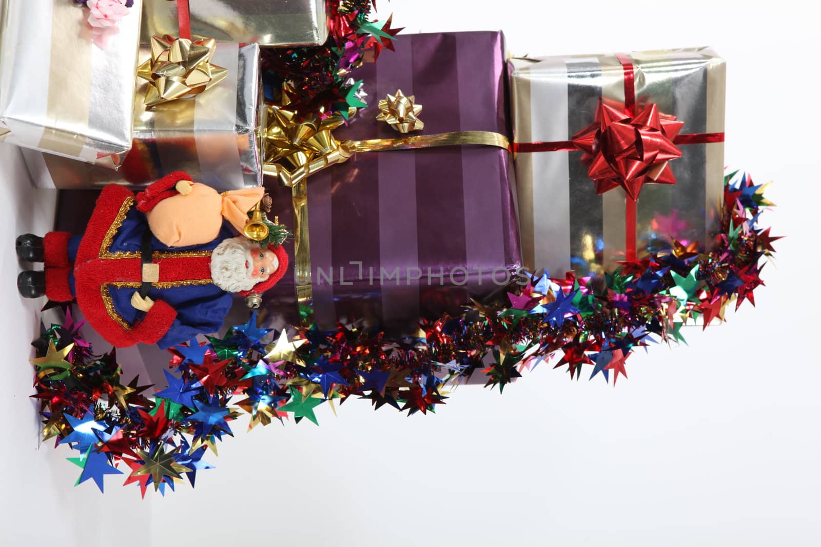 Stack of gifts on white background by phovoir