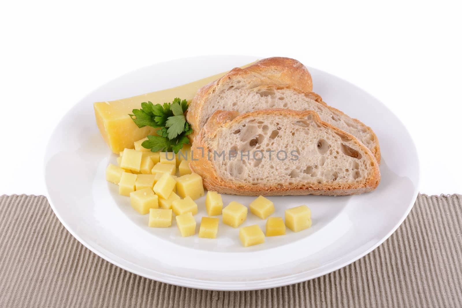 Bread and chesse on dish.