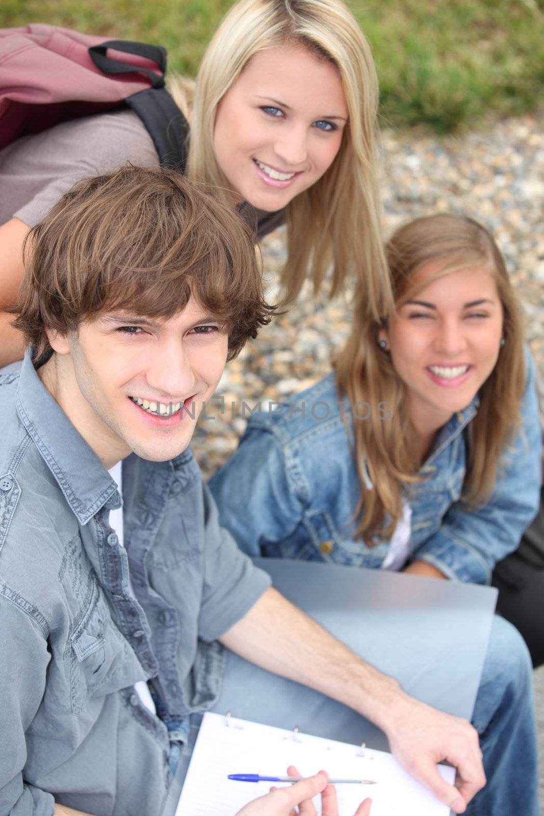 Three high school friends outdoors