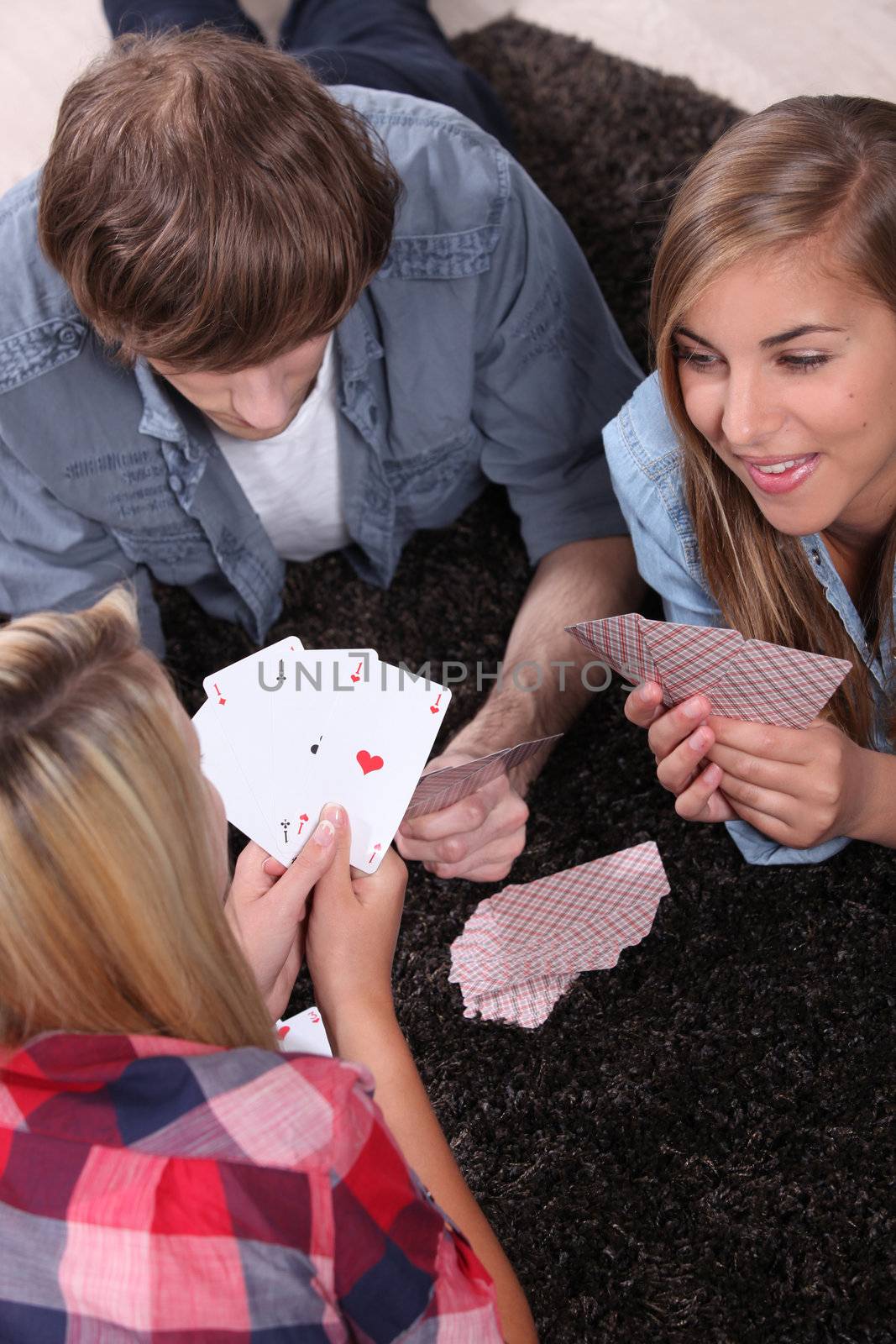 Teen playing cards