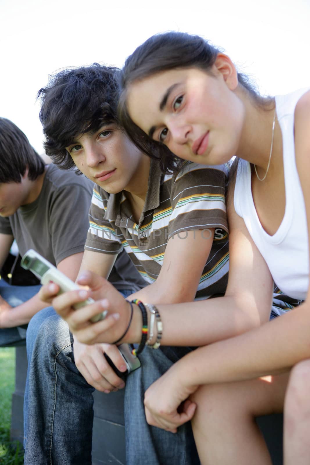 teenagers spending time together by phovoir