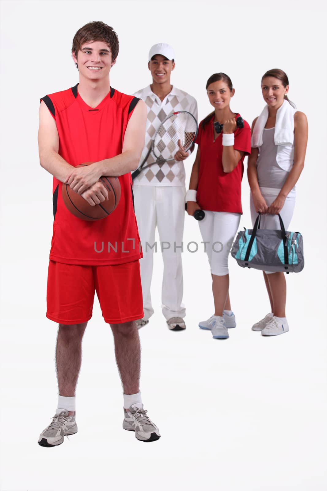 portrait of 4 sporty people