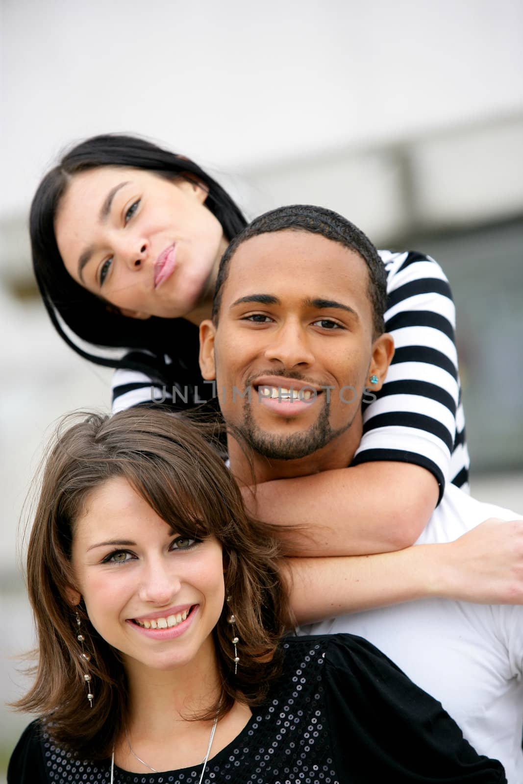 Three friends hanging out in the city by phovoir