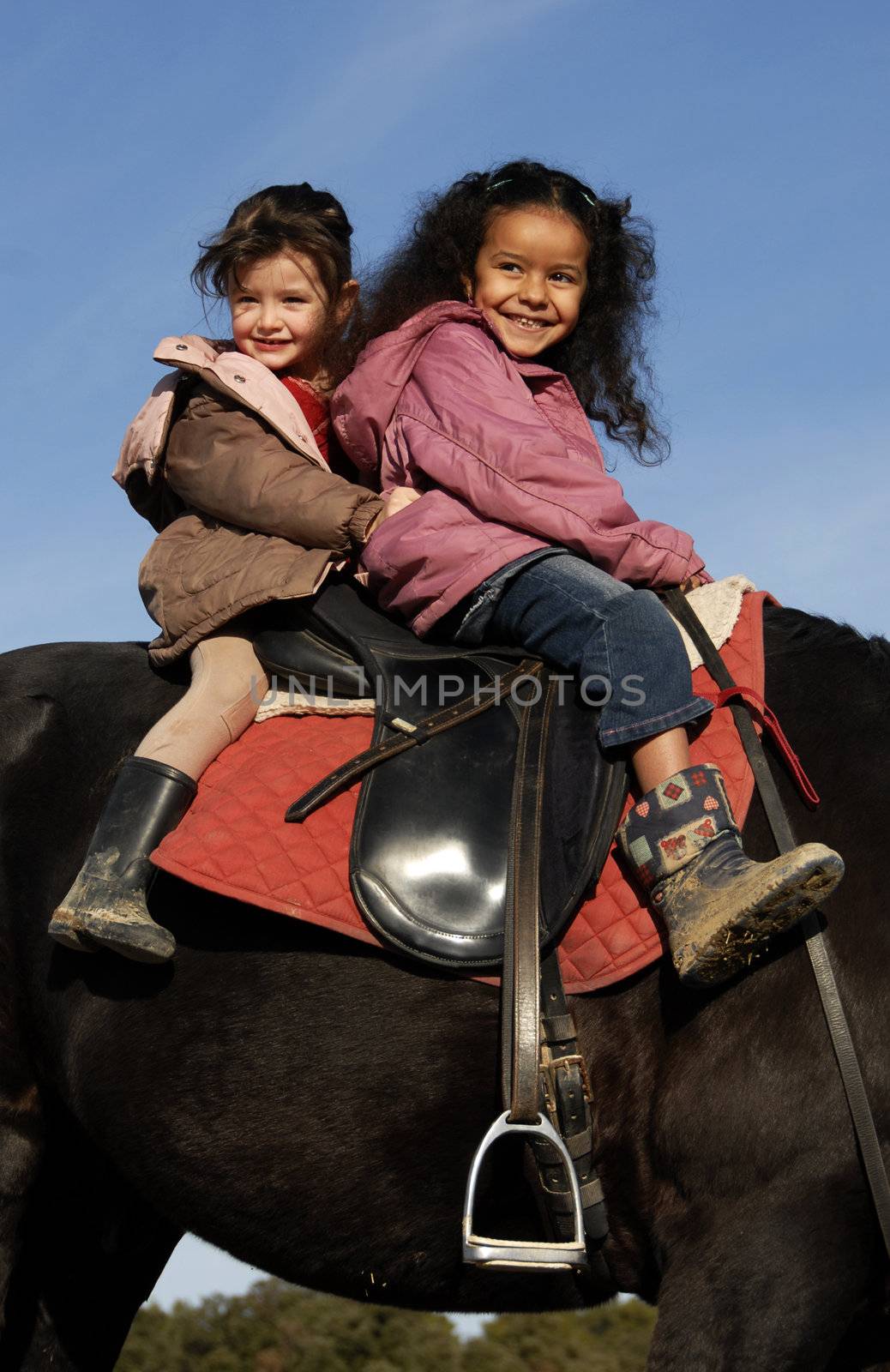 two riding little girls by cynoclub