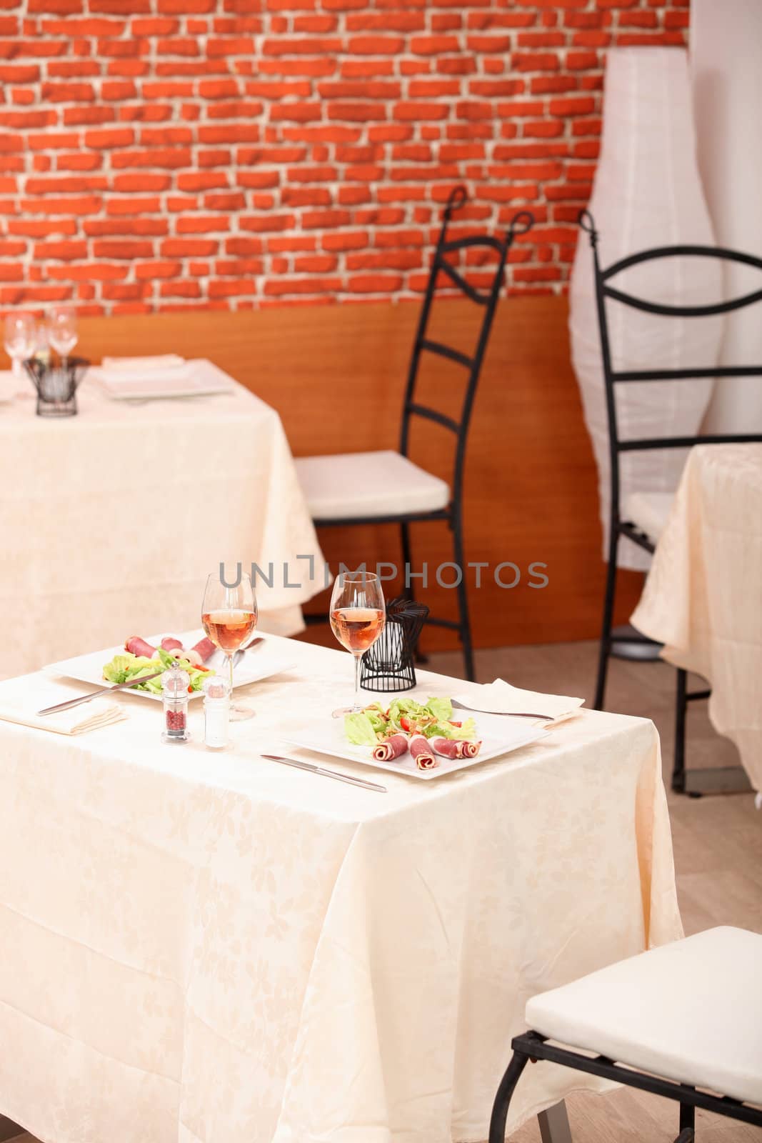 meal for two in a restaurant by phovoir