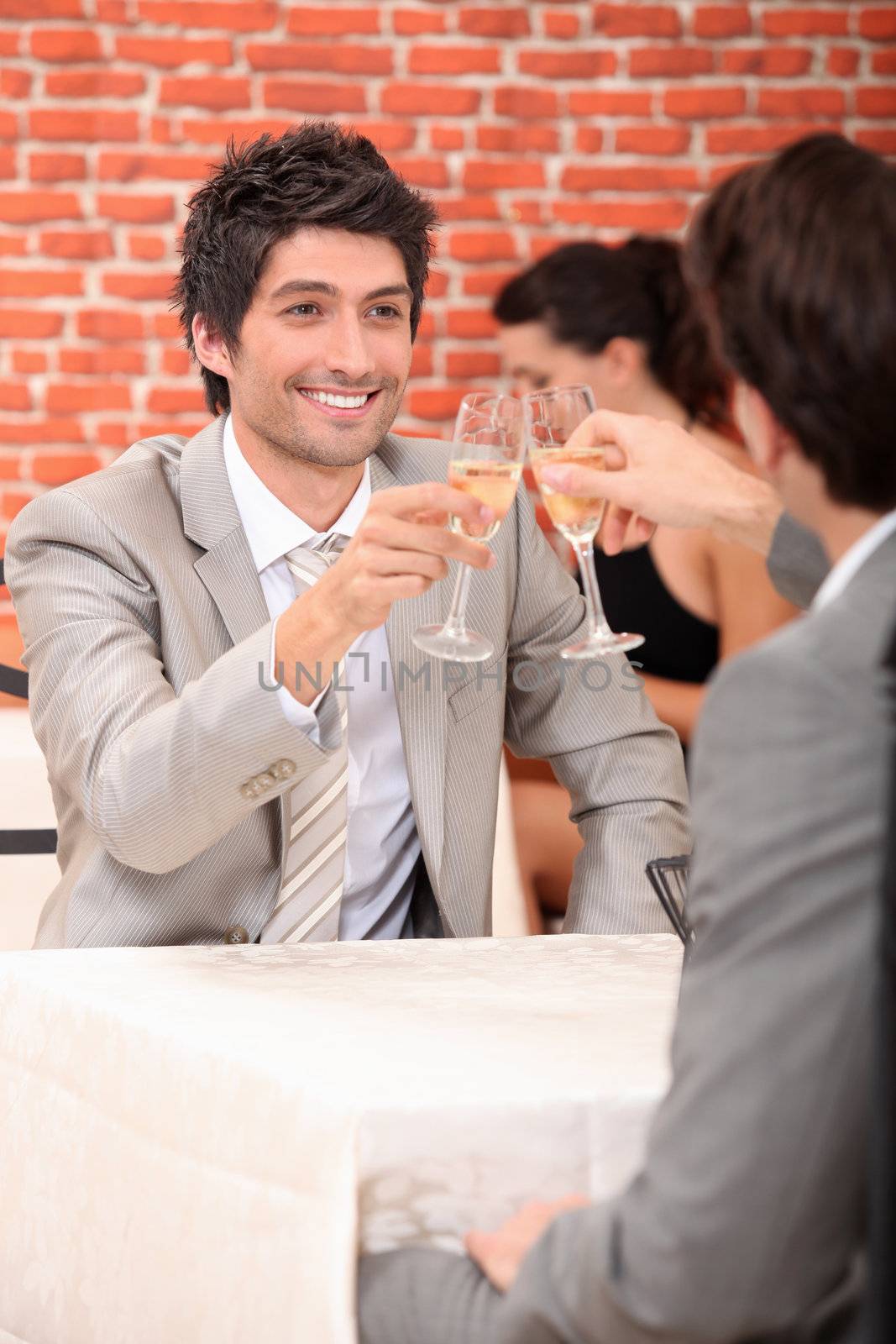 Men drinking champagne