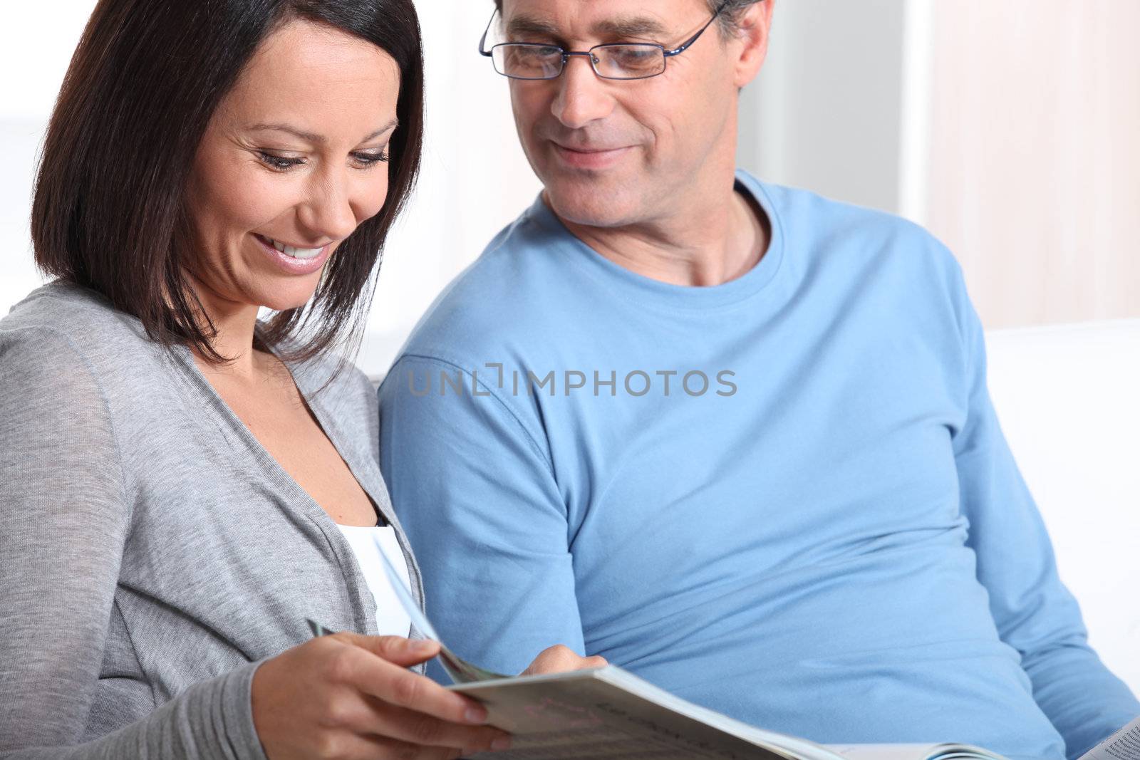 Couple looking at a photo album