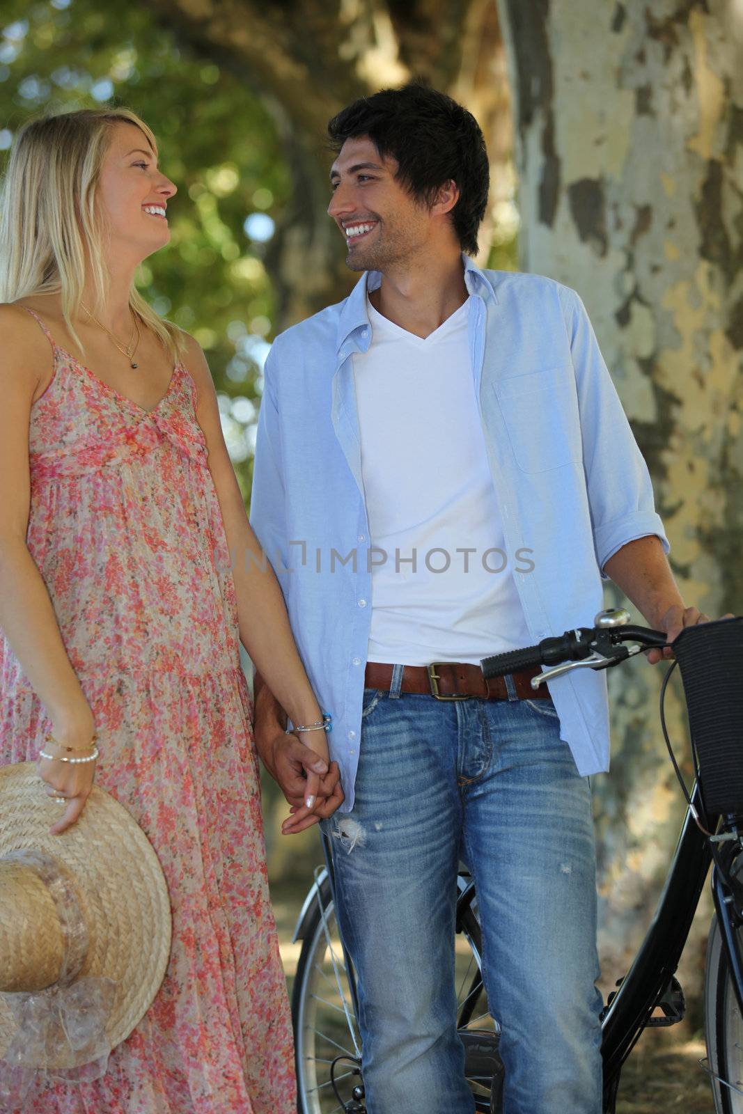 Romantic couple with a bike