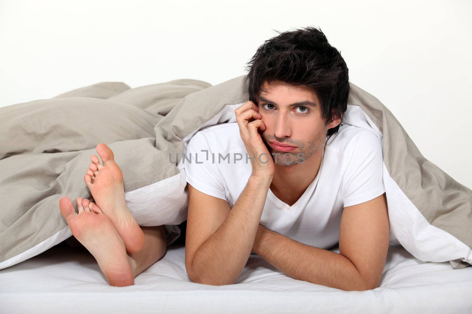 Bored husband in bed by phovoir
