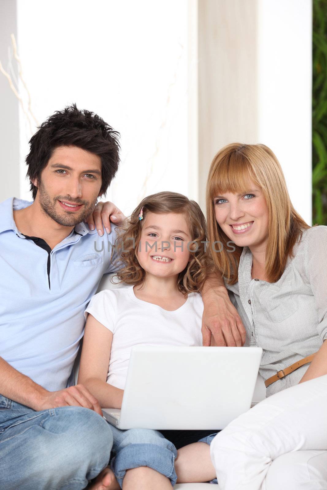 Family with a laptop by phovoir