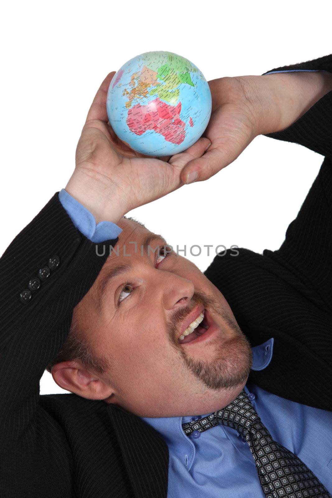 Businessman collapsing under the weight of the world