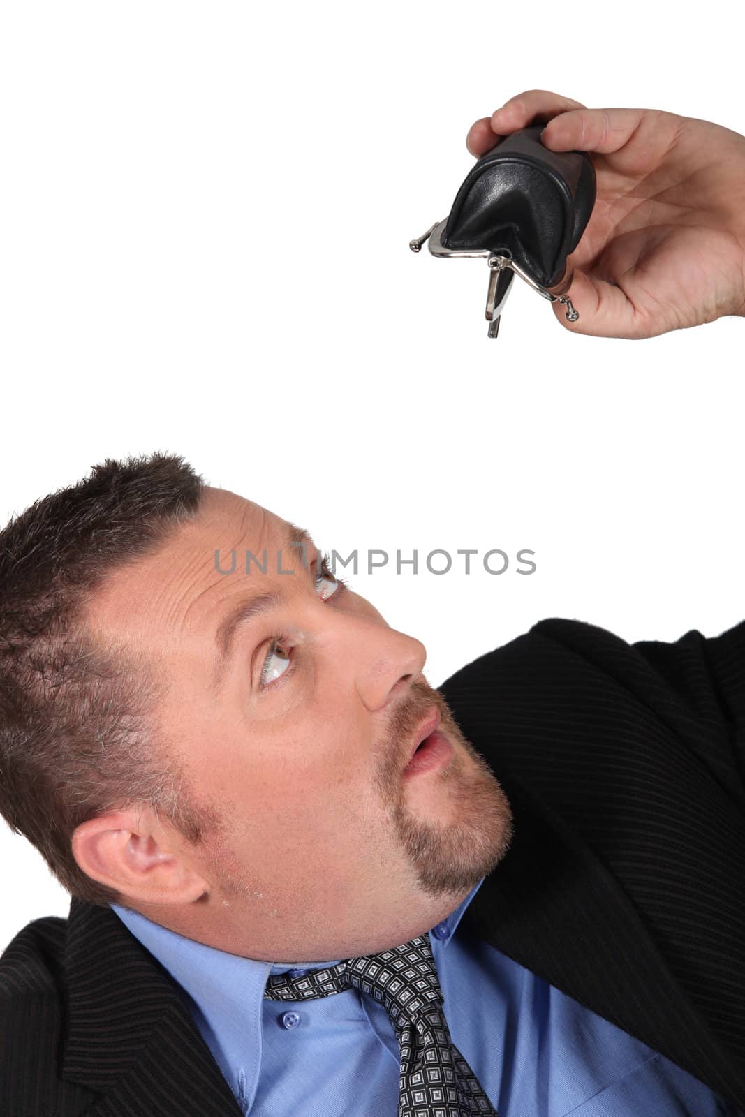 businessman looking at his empty wallet by phovoir