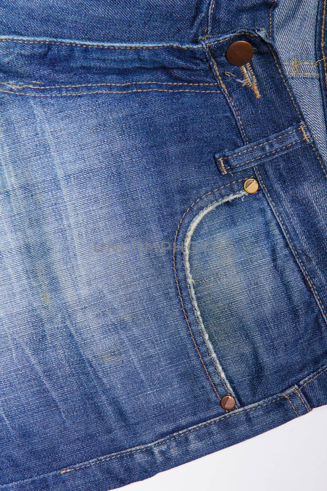 dirty blue jeans for men. Close-up.