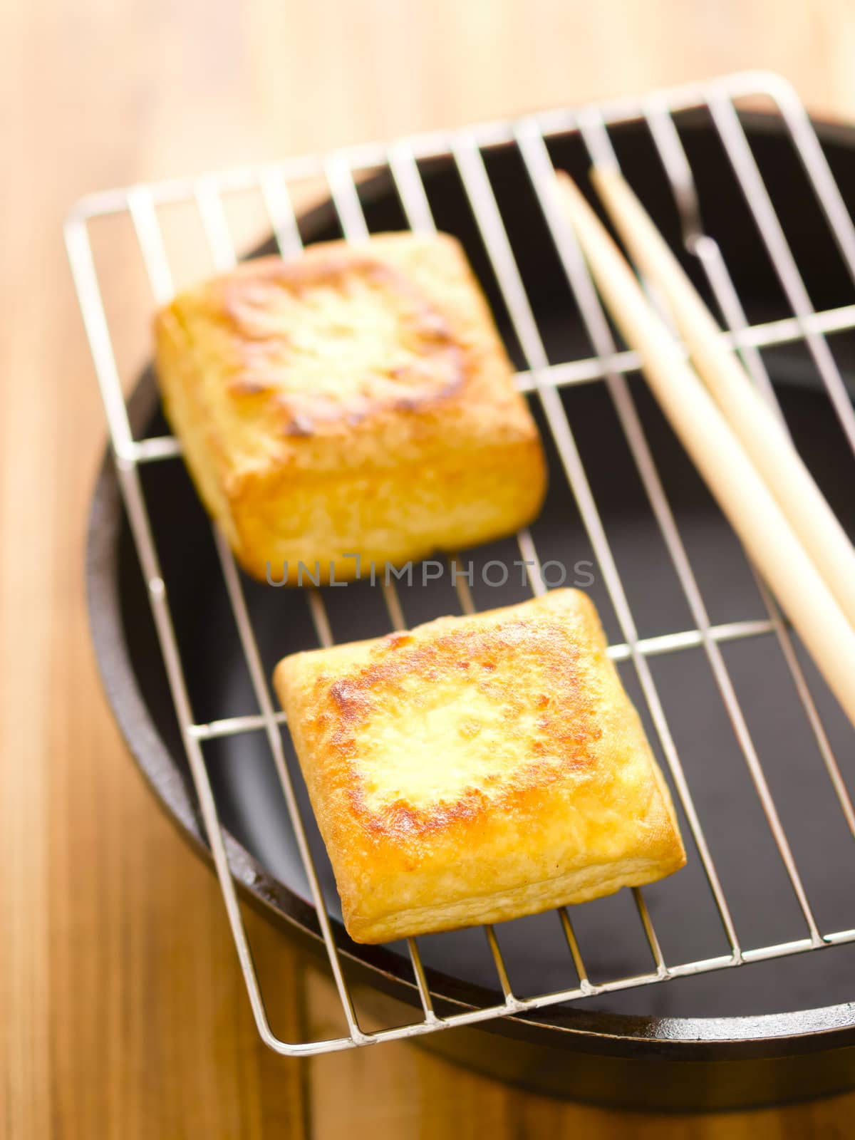 close up of fried tofu cubes