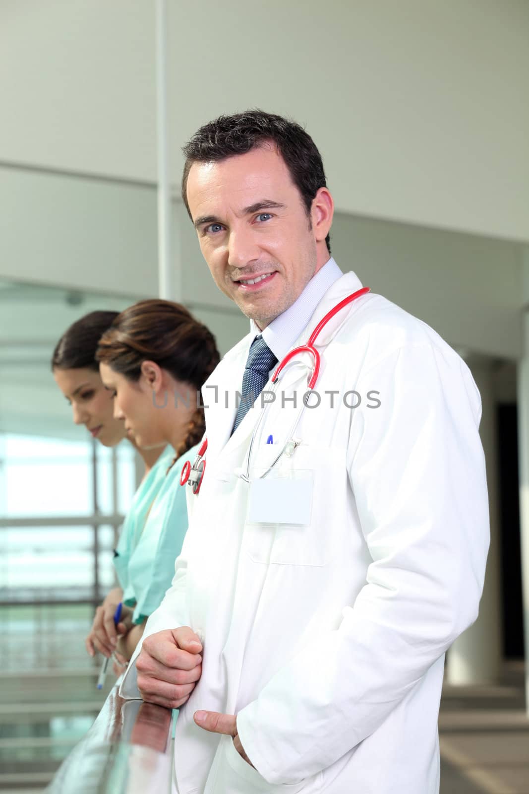 young doctor and two nurses in the hospital