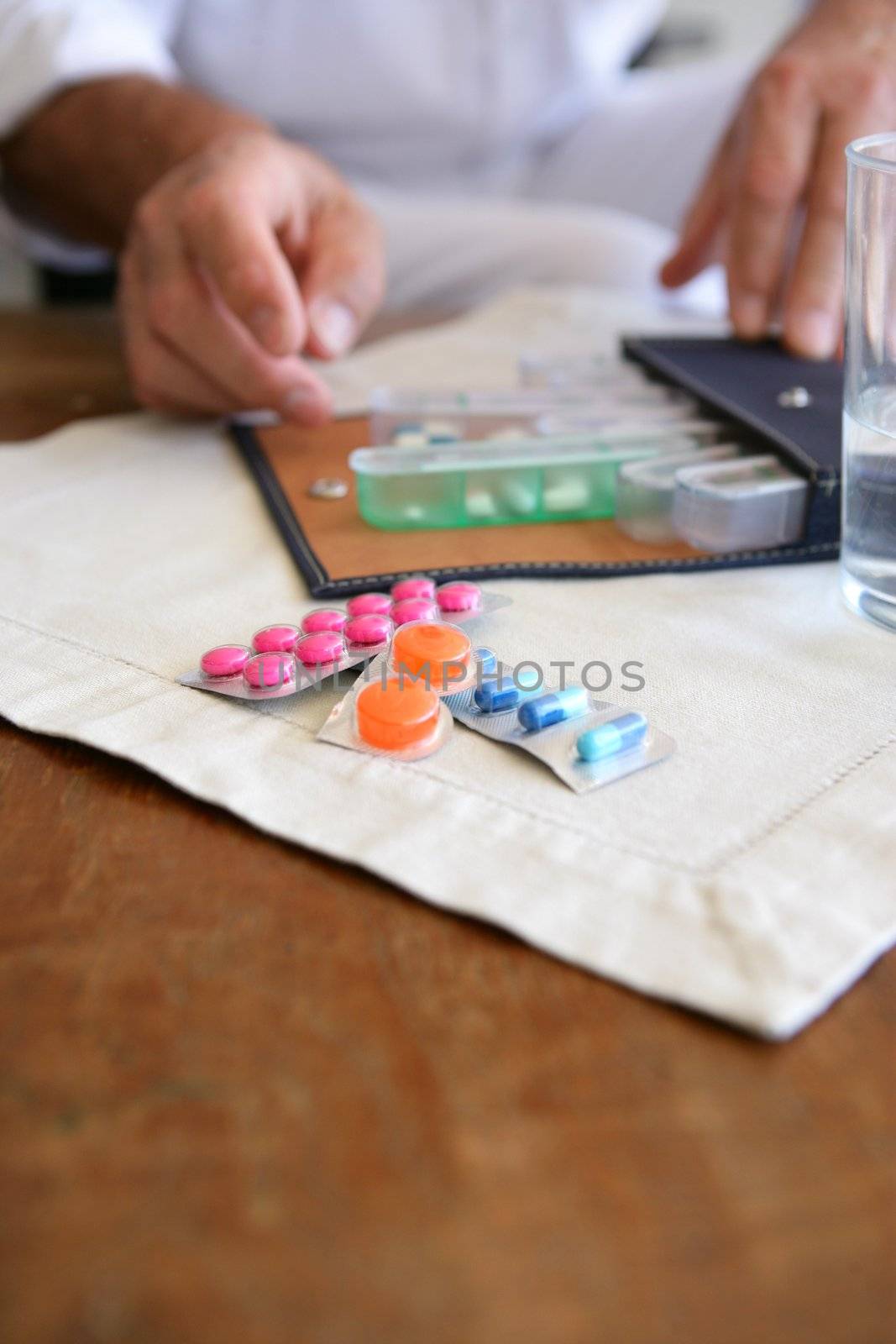 Man sorting out his medication
