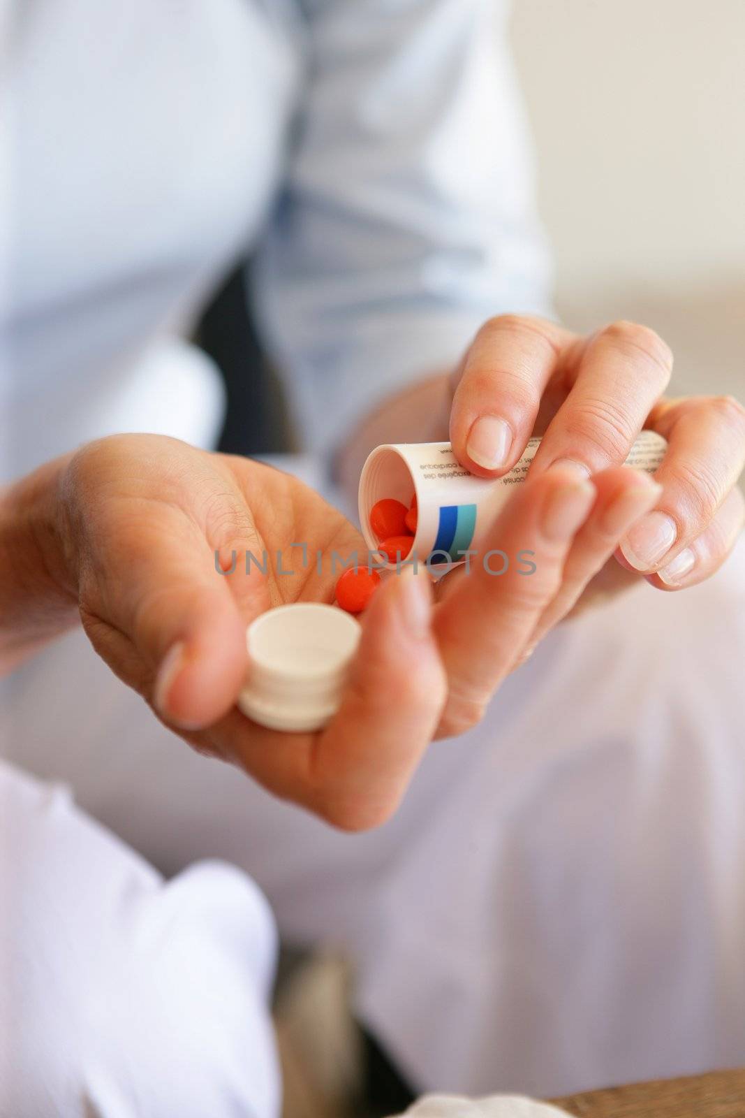 Woman with medication by phovoir