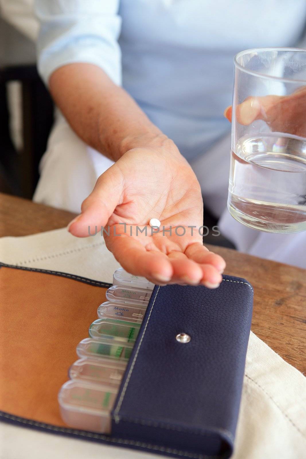 Person taking medication by phovoir