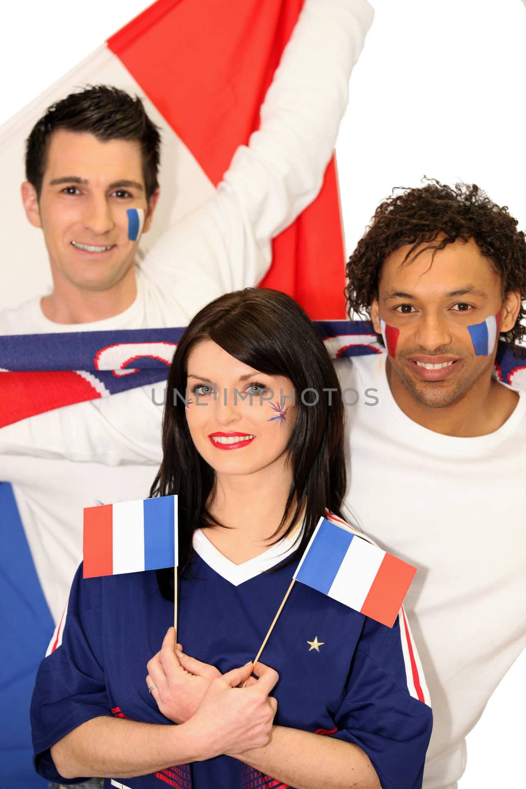 Three French people supporting their national team