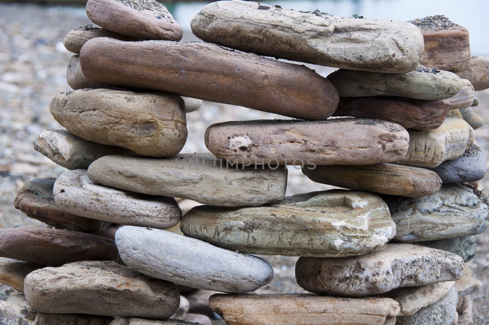 Philosofy nature stone on sea shore closeup