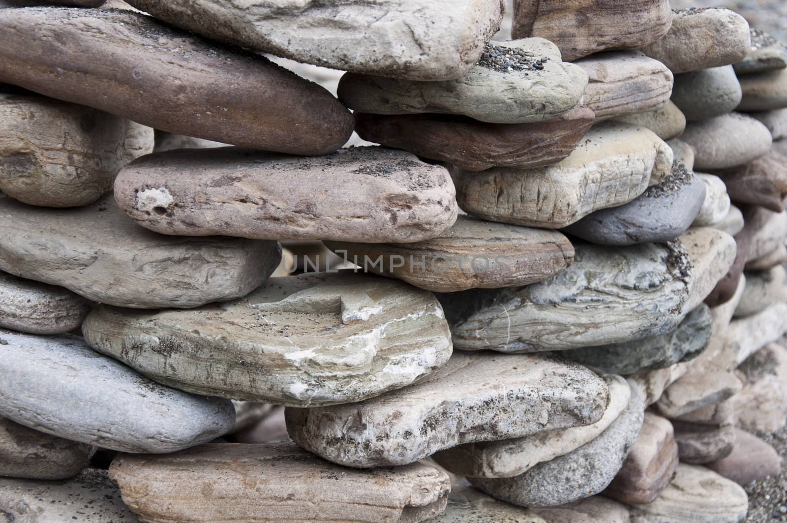 Philosofy nature stone on sea shore closeup