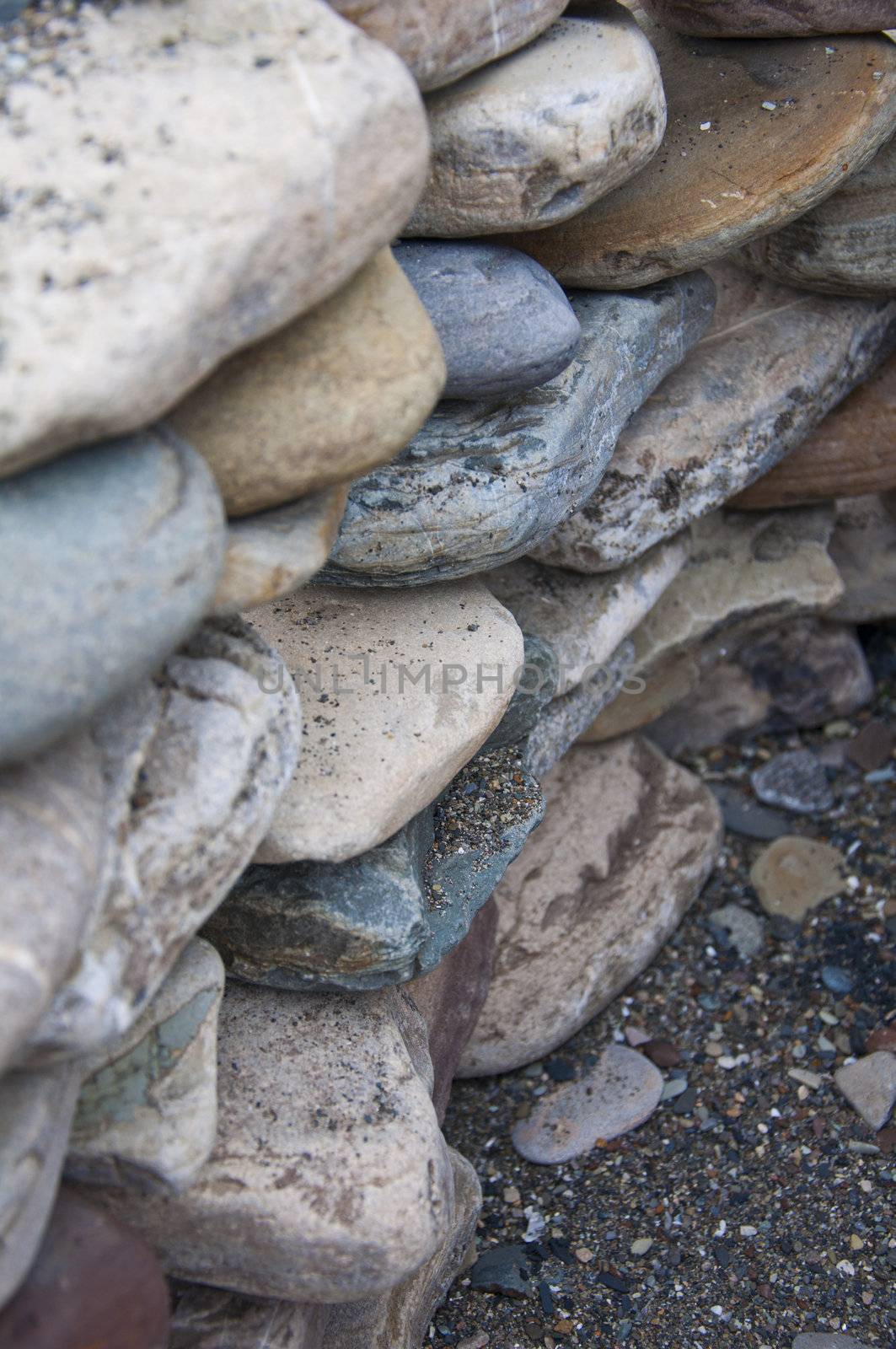 Philosofy nature stone on sea shore closeup