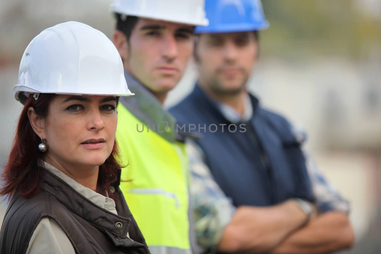 Three construction colleagues
