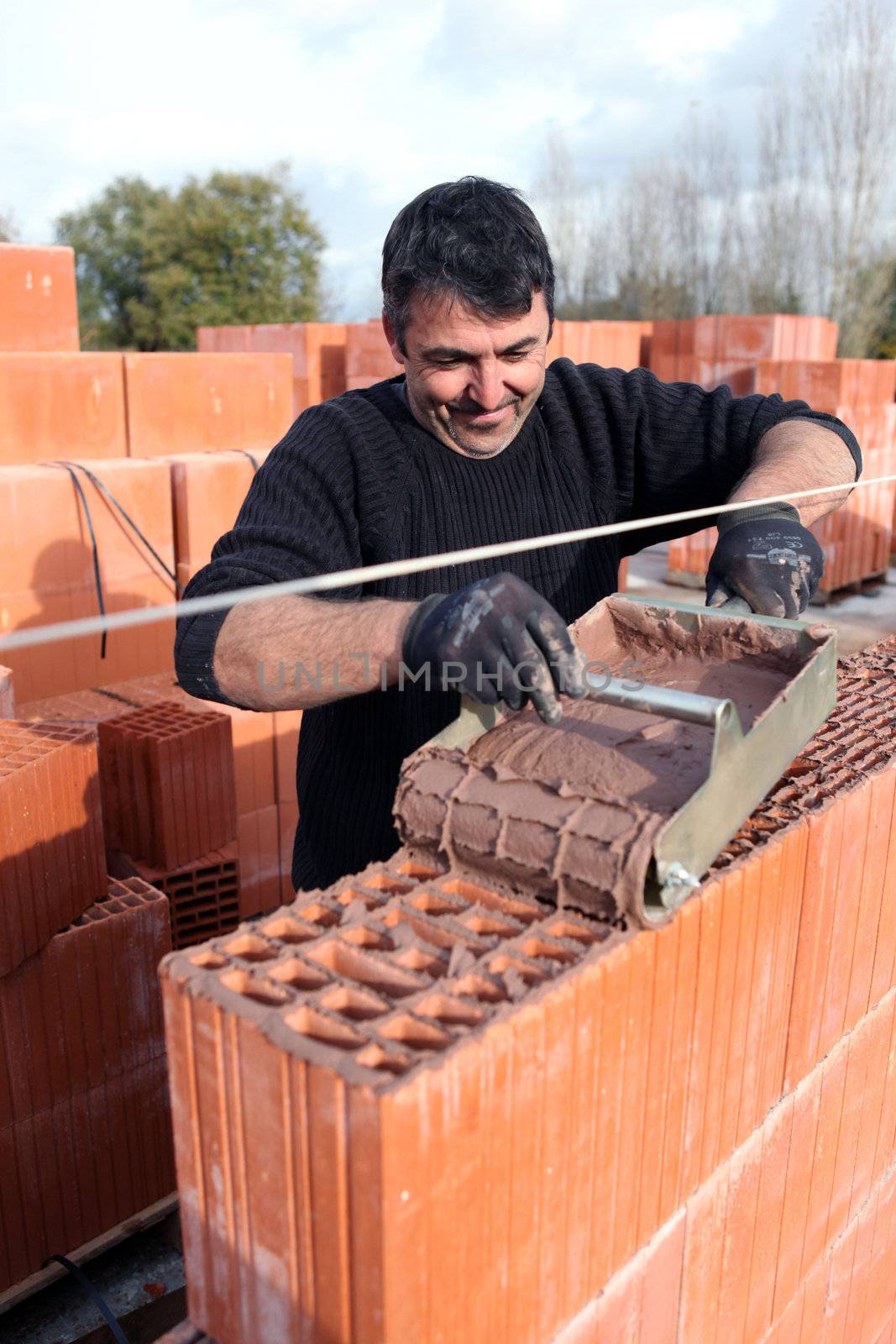 Portrait of a bricklayer by phovoir