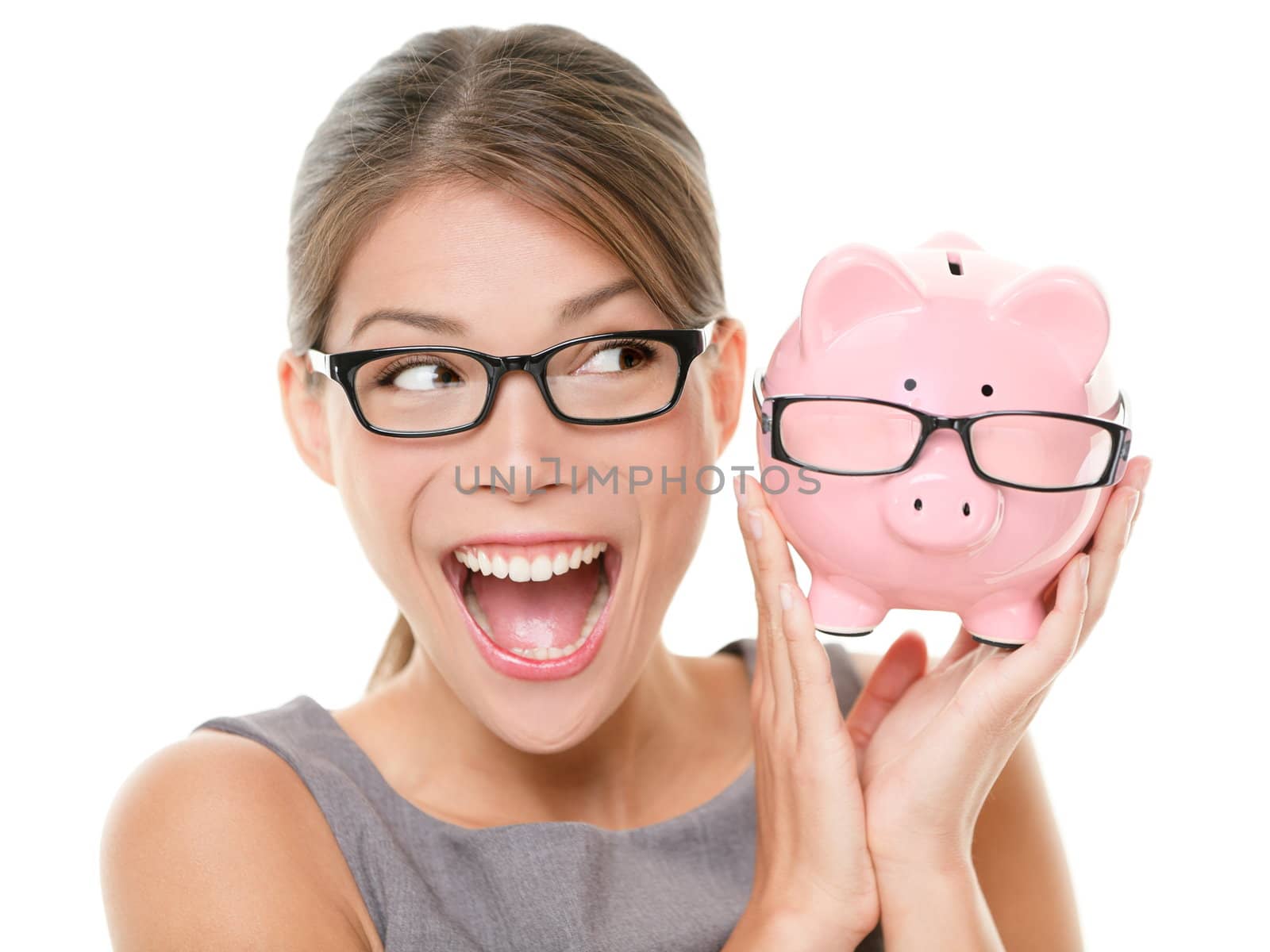 Save money on glasses eyewear. Woman happy and excited over savings on buying eyewear glasses. Piggybank and woman wearing glasses isolated on white background.