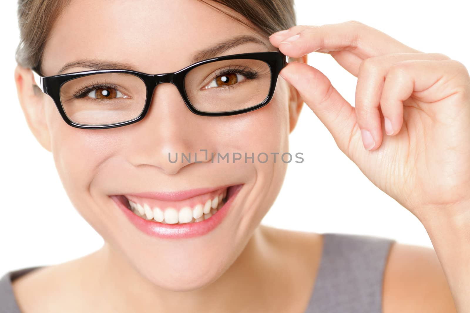 Eyewear glasses woman happy holding showing her new glasses smiling on white background. Beautiful young multiethnic Asian Chinese / Caucasian female model in her twenties.