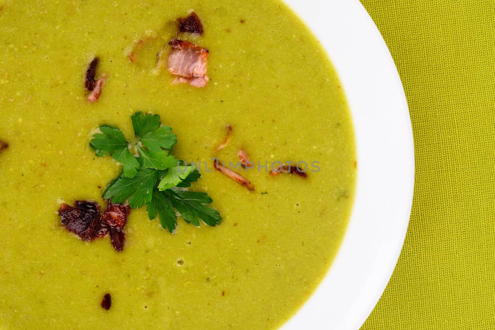 Pea soup with small pieces of bacon.