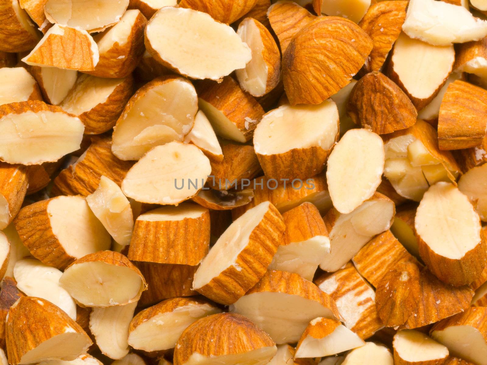 close up of chopped almonds food background