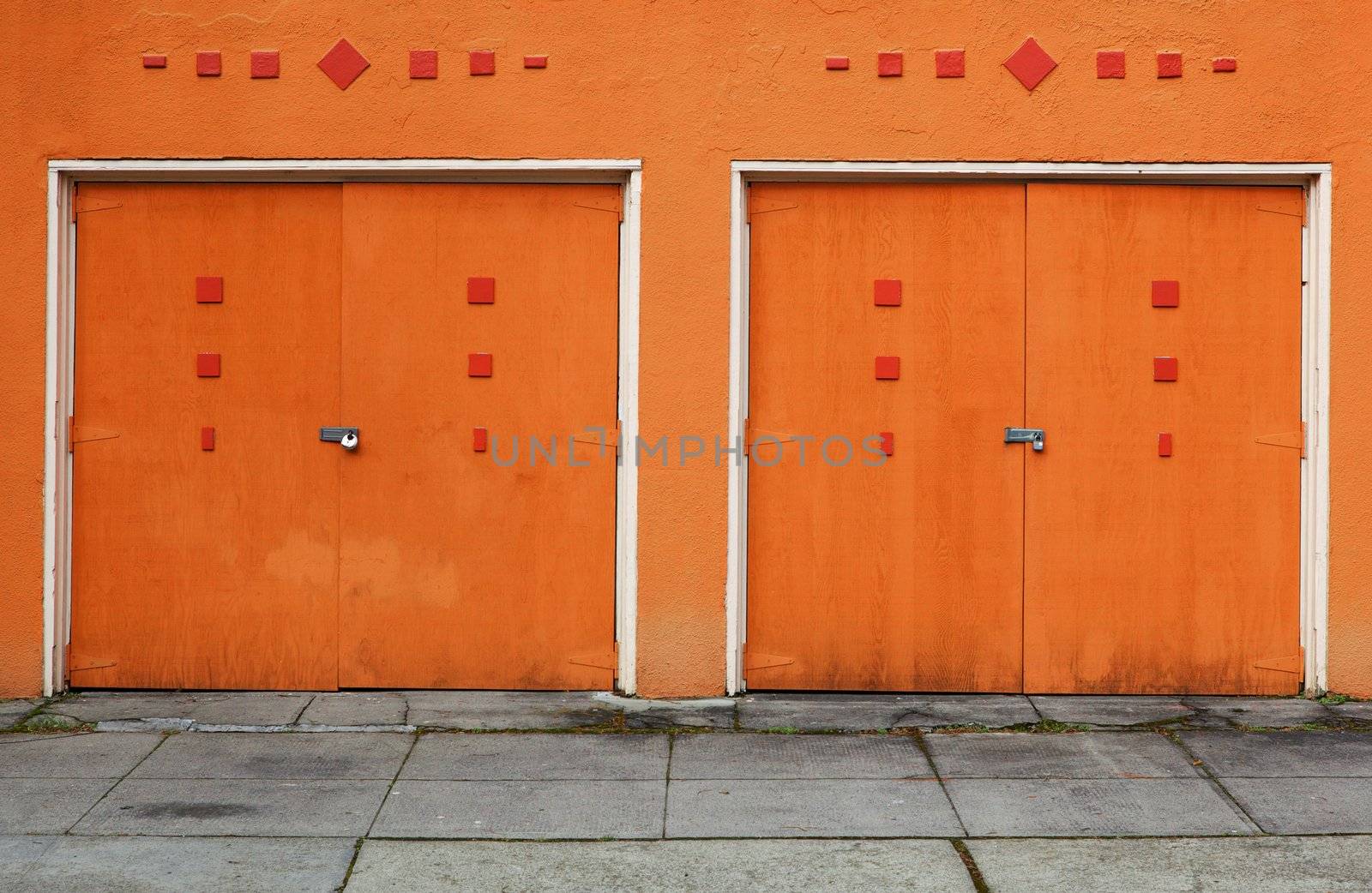 Two Orange Garage Doors by bobkeenan