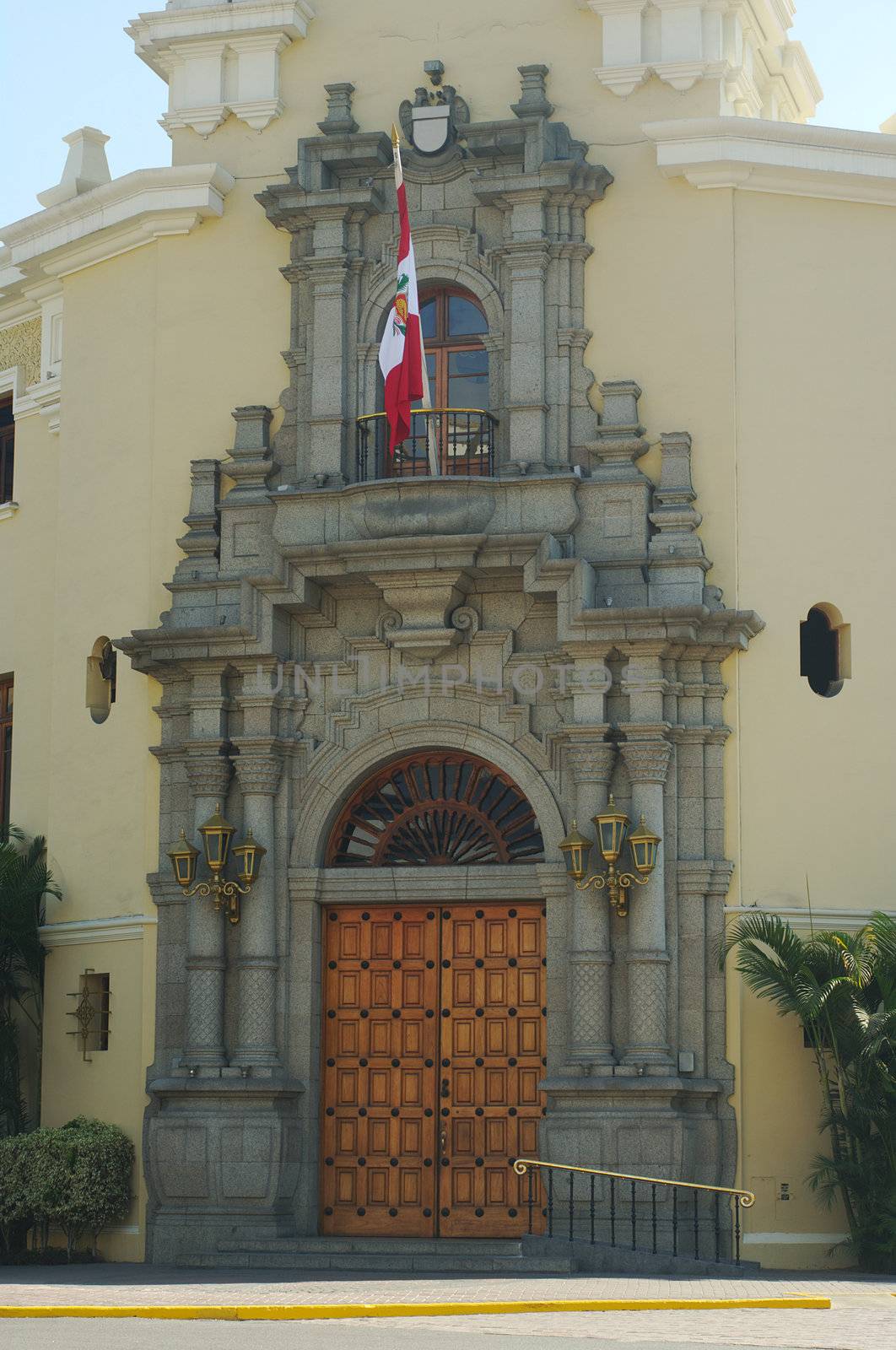 The entry of the Miraflores Town Hall in Lima, Peru with the Peruvian flag 