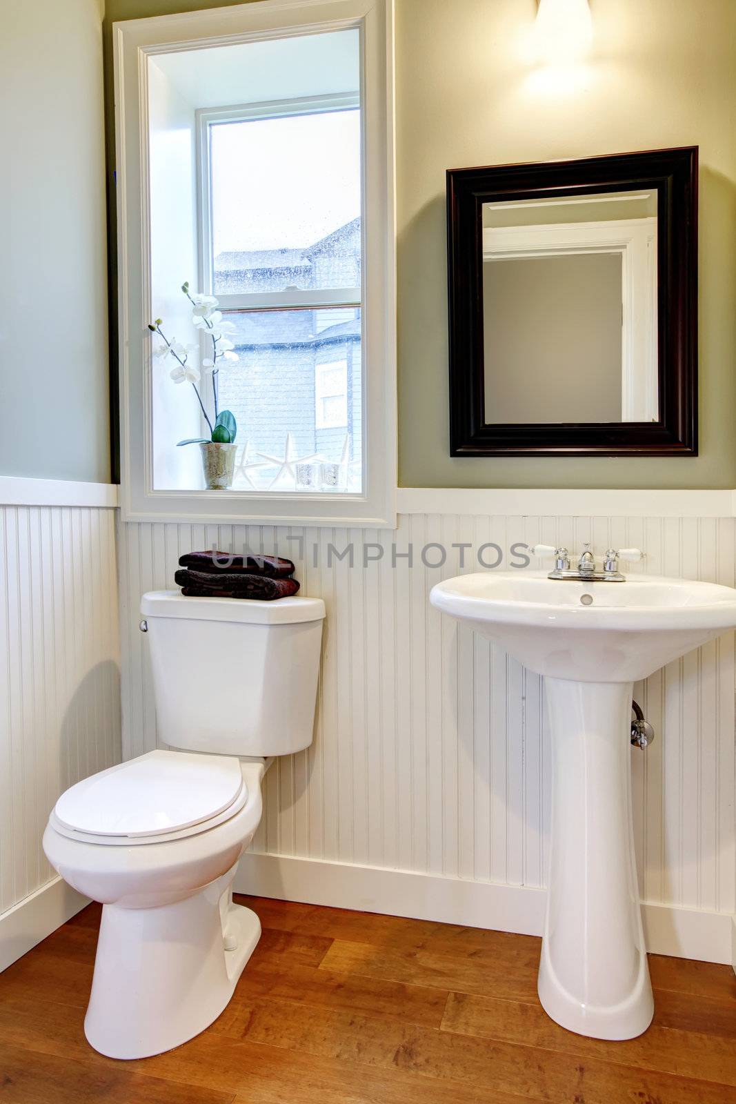 Nice small new simple and elegant bathroom.