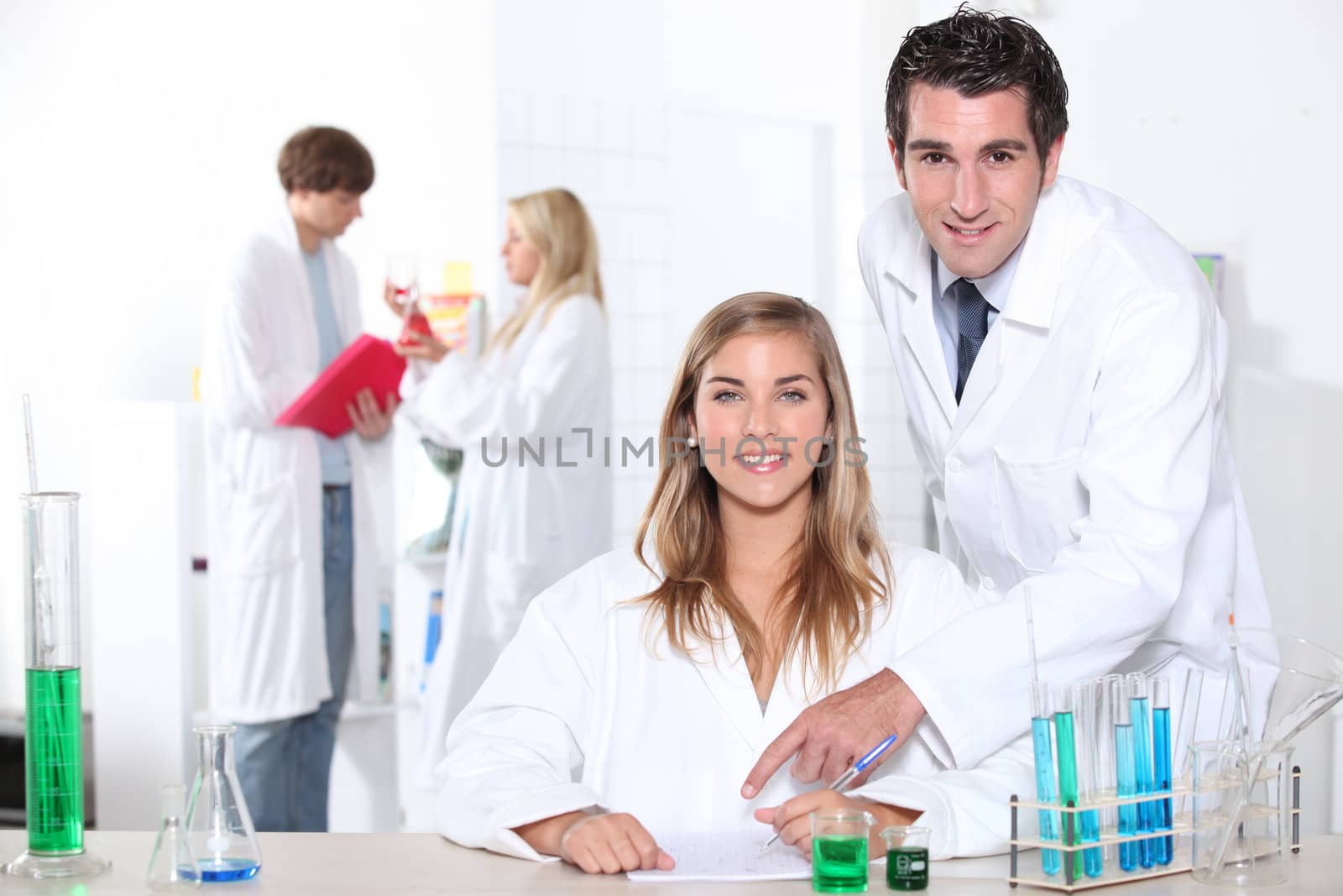 science student in the lab by phovoir