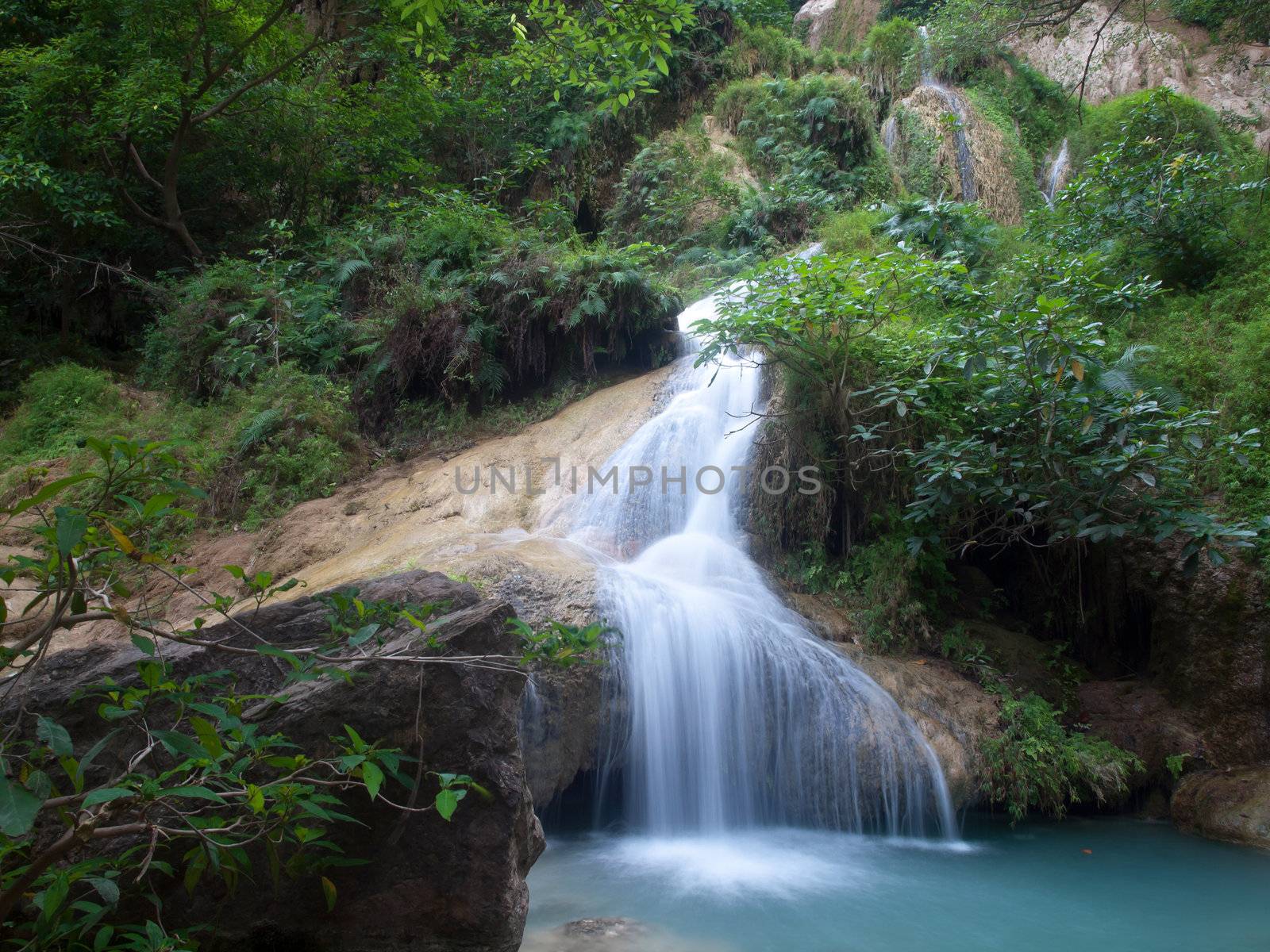 Emerald color water in tier seventh of Erawan waterfall, Erawan National Park, Kanchanaburi, Thailand