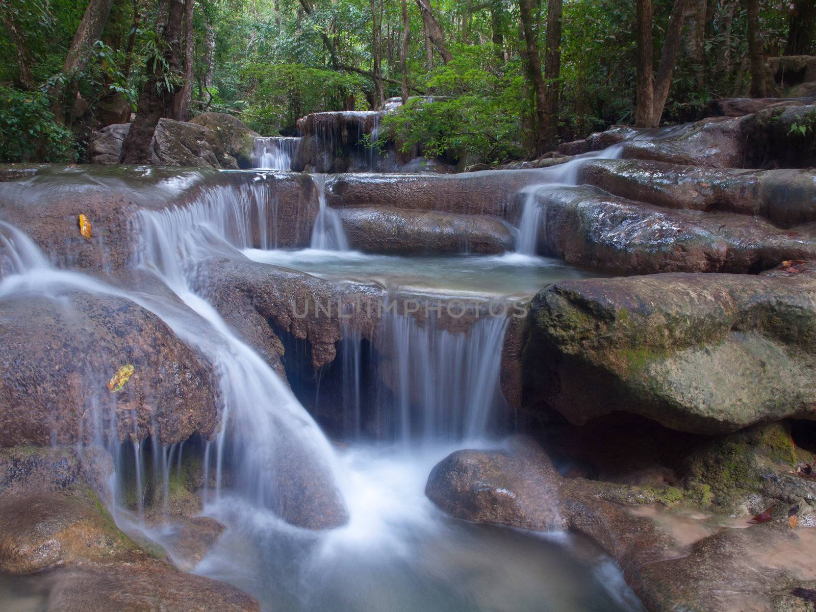 Emerald color water in tier fifth of Erawan waterfall, Erawan National Park, Kanchanaburi, Thailand