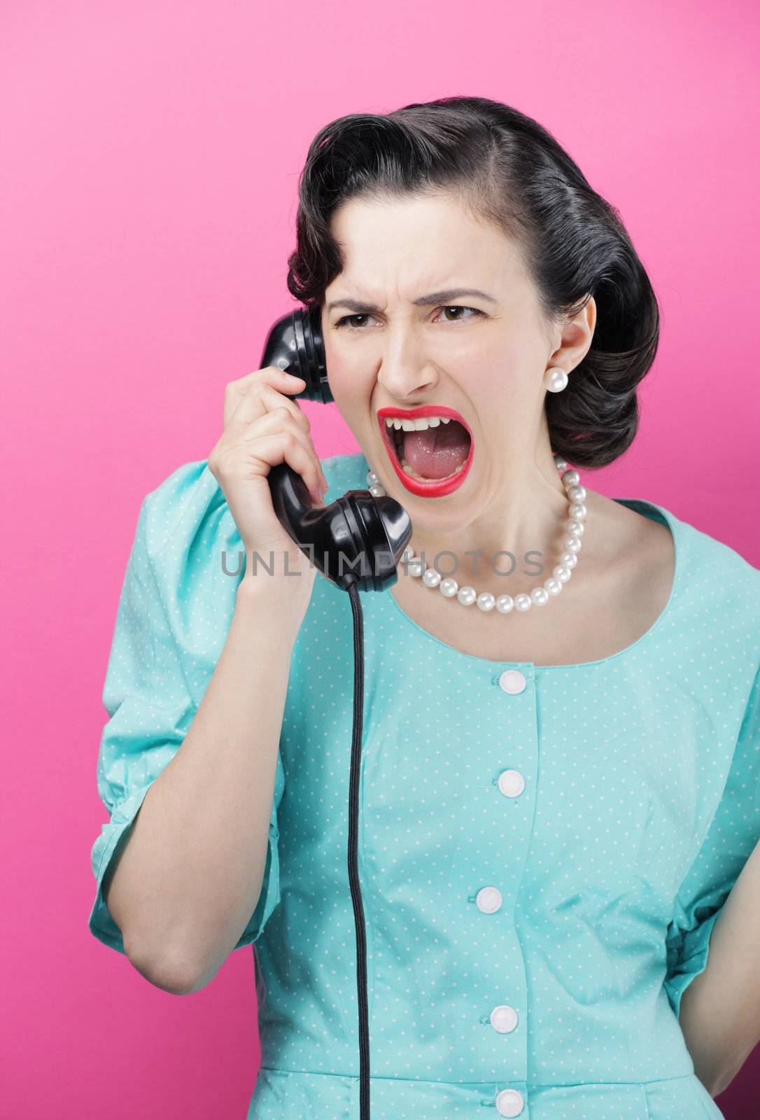 Vintage Woman shouting into telephone