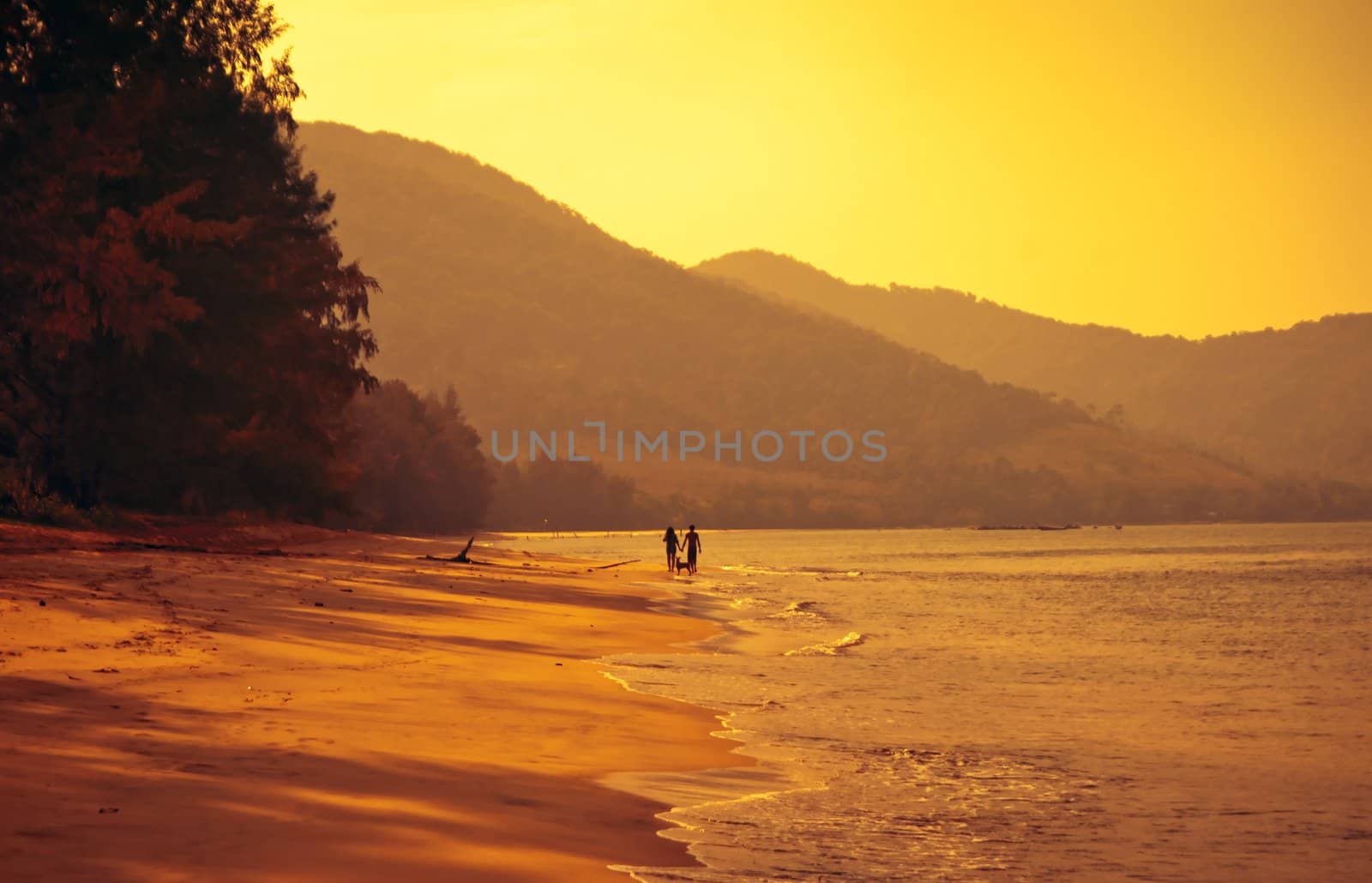 couple on beach by clearviewstock