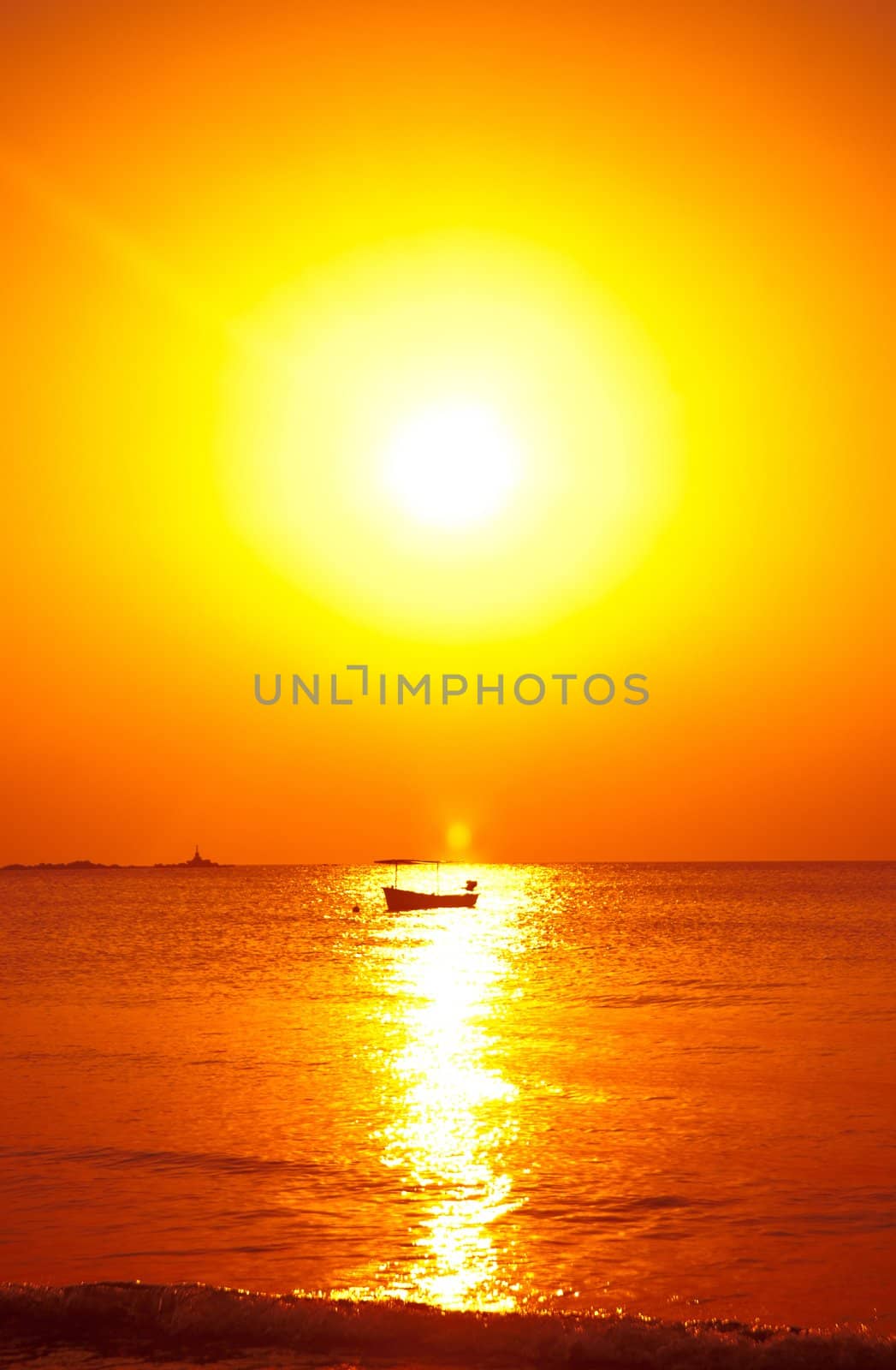 tropical island sunset boat by clearviewstock