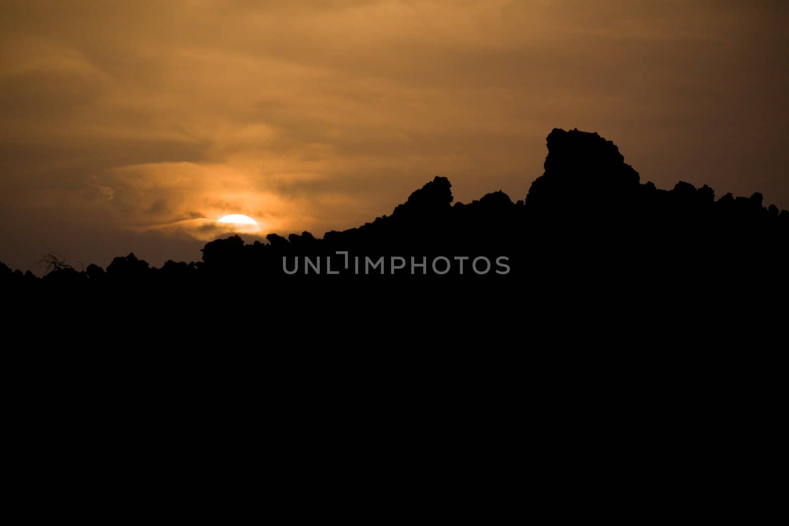 Sunset in Volcanic park Timanfaya on island Lanzarote, Canary Islands