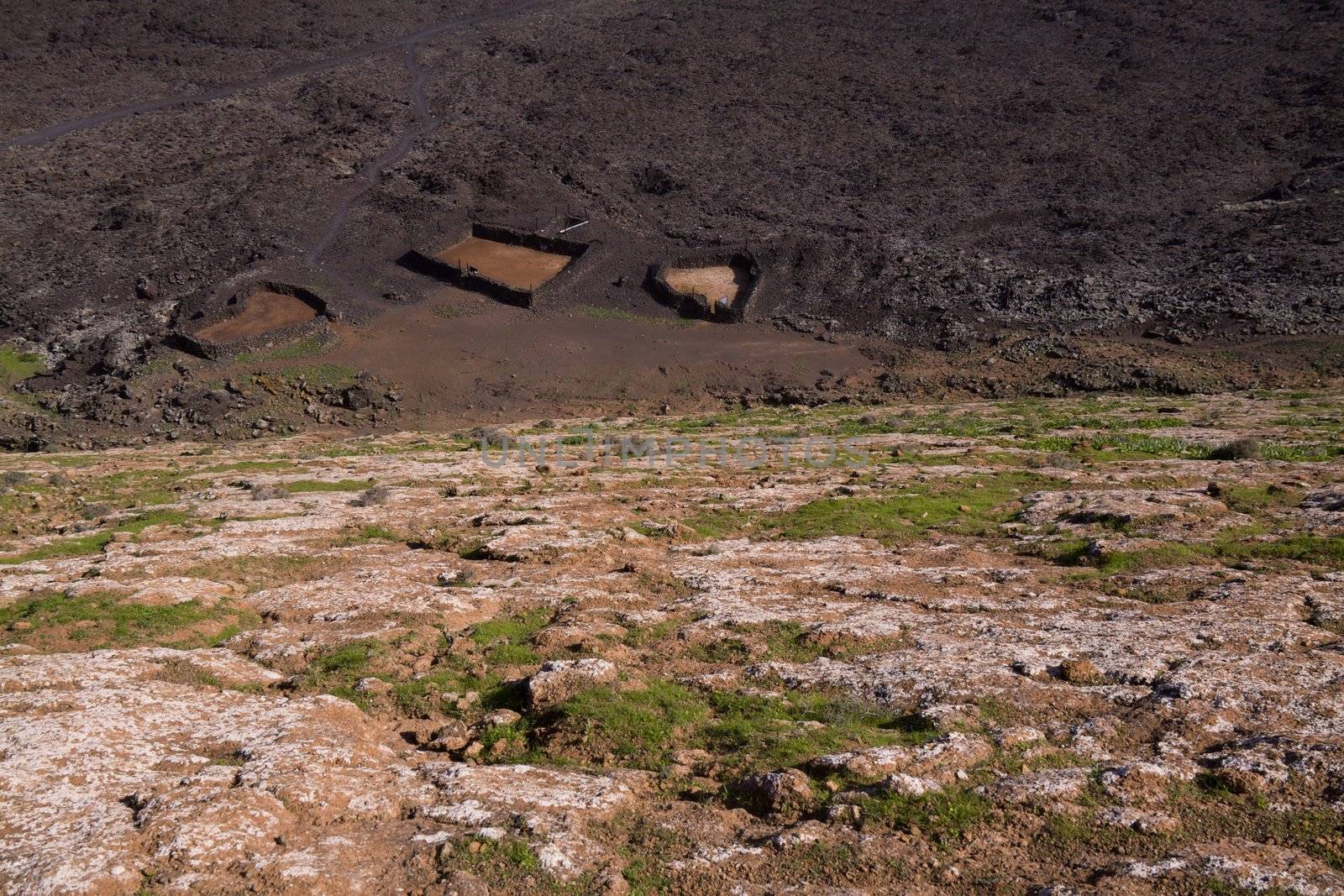 Empty animal farm underneath volcano in Volcanic park Timanfaya on island Lanzarote, Canary Islands