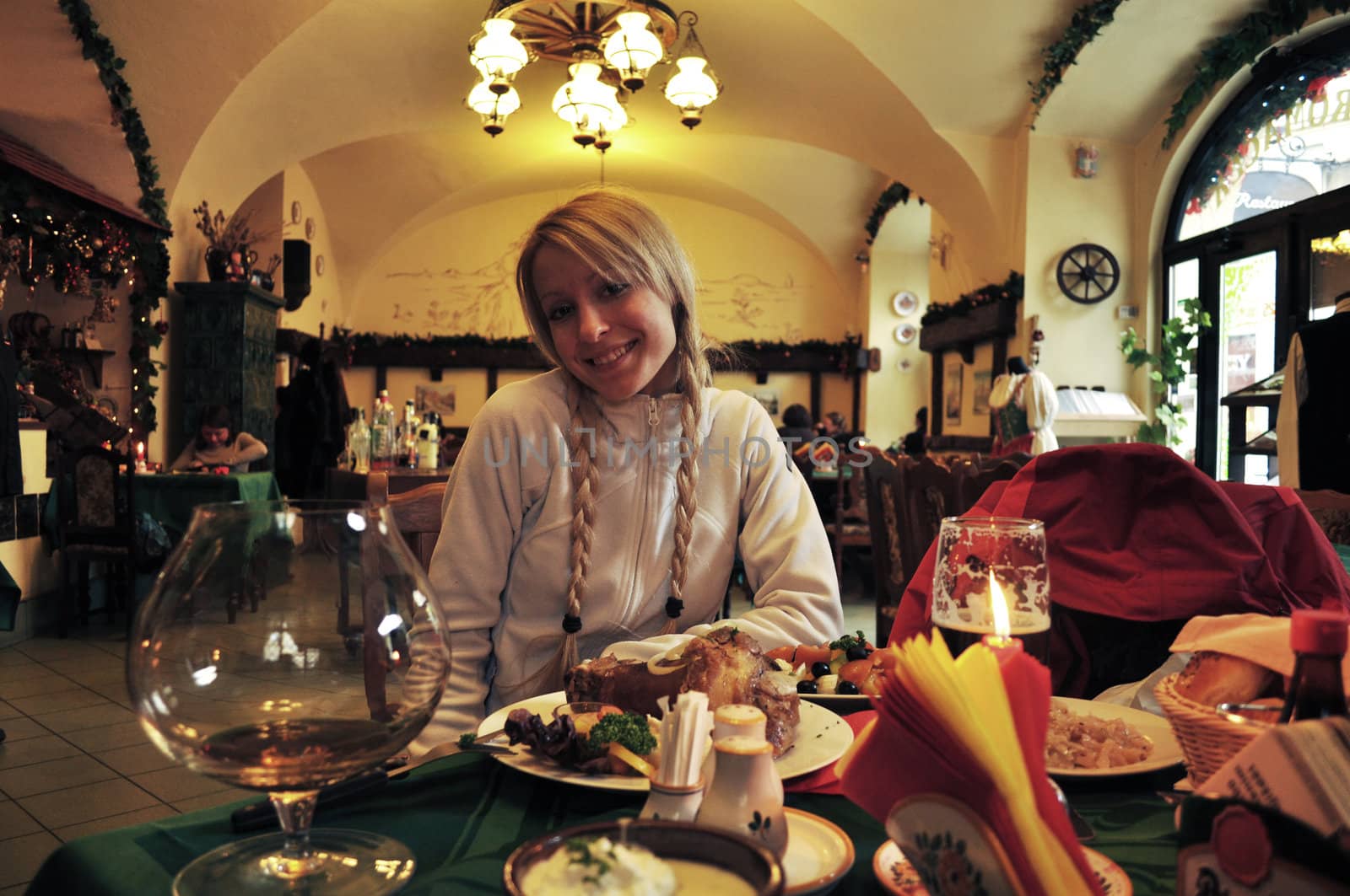 Beautiful young woman in National Czech restaurant