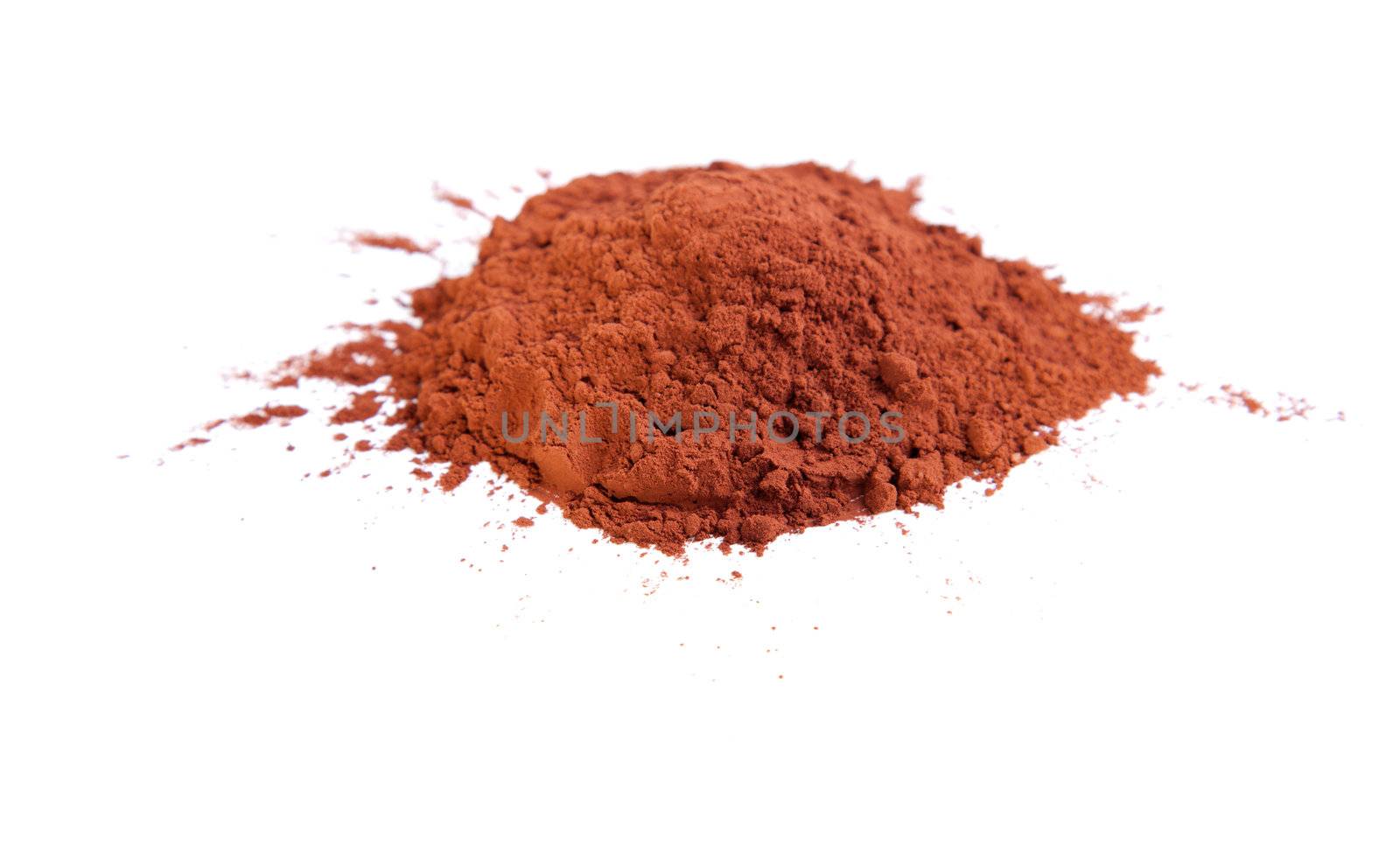 Cocoa powder on a white background by motorolka